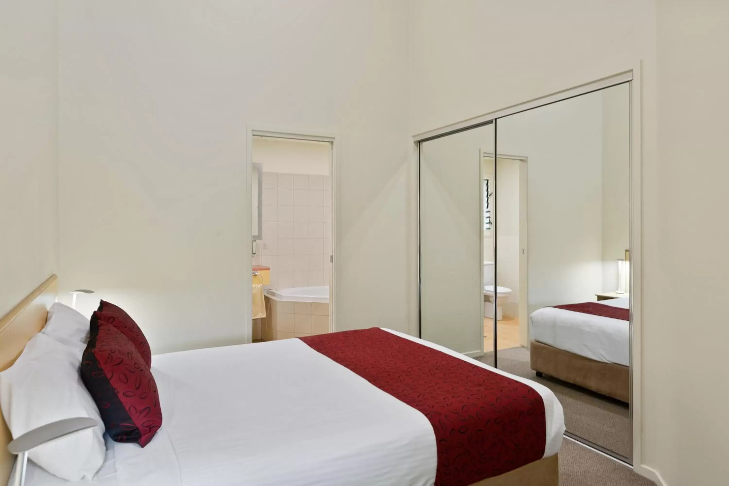 Bed in Tathra Beach House Holiday Apartments