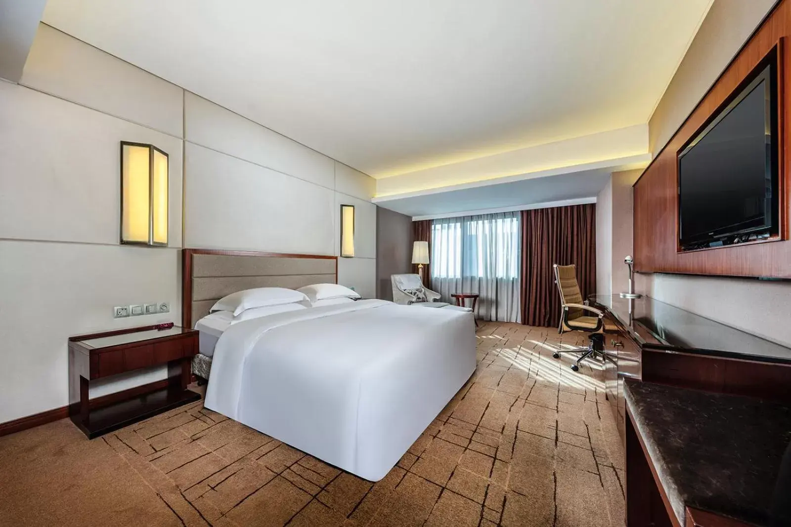 Photo of the whole room in Crowne Plaza Foshan, an IHG Hotel - Exclusive bus stations for HKSAR round-trips