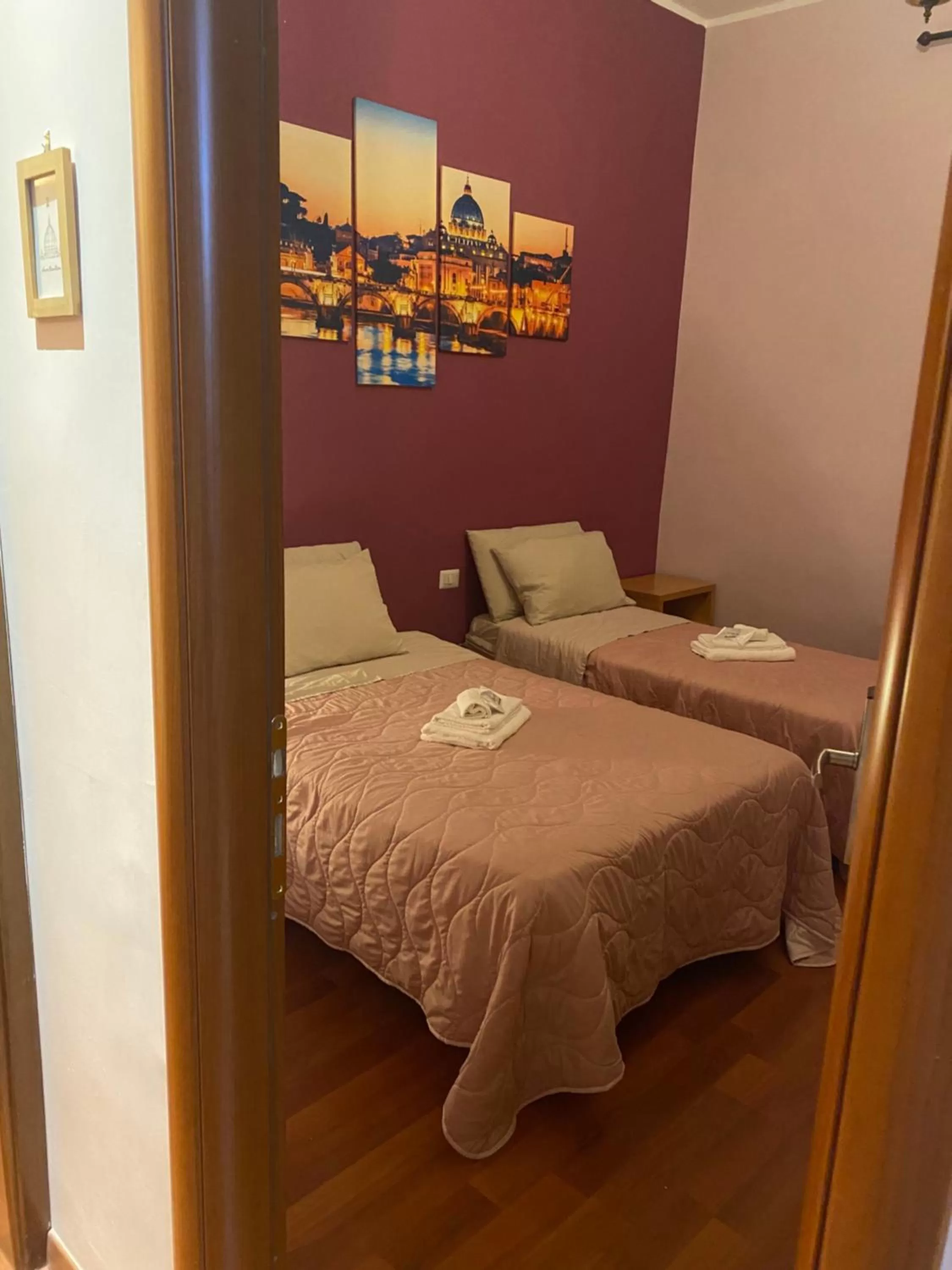 Bed in AmareRomaRooms