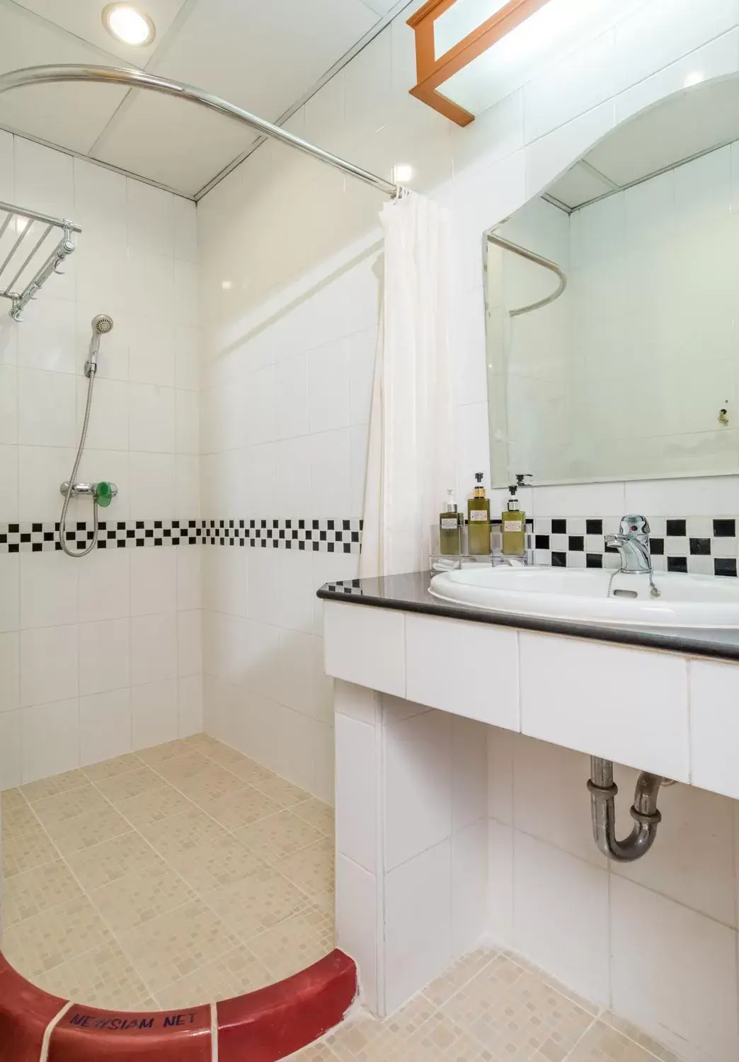 Bathroom in New Siam Riverside - SHA Certified