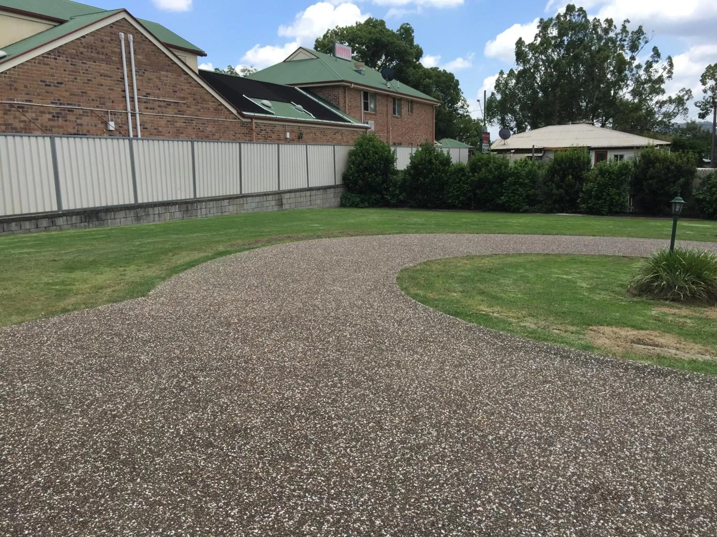 Parking, Property Building in Country Gardens Motor Inn