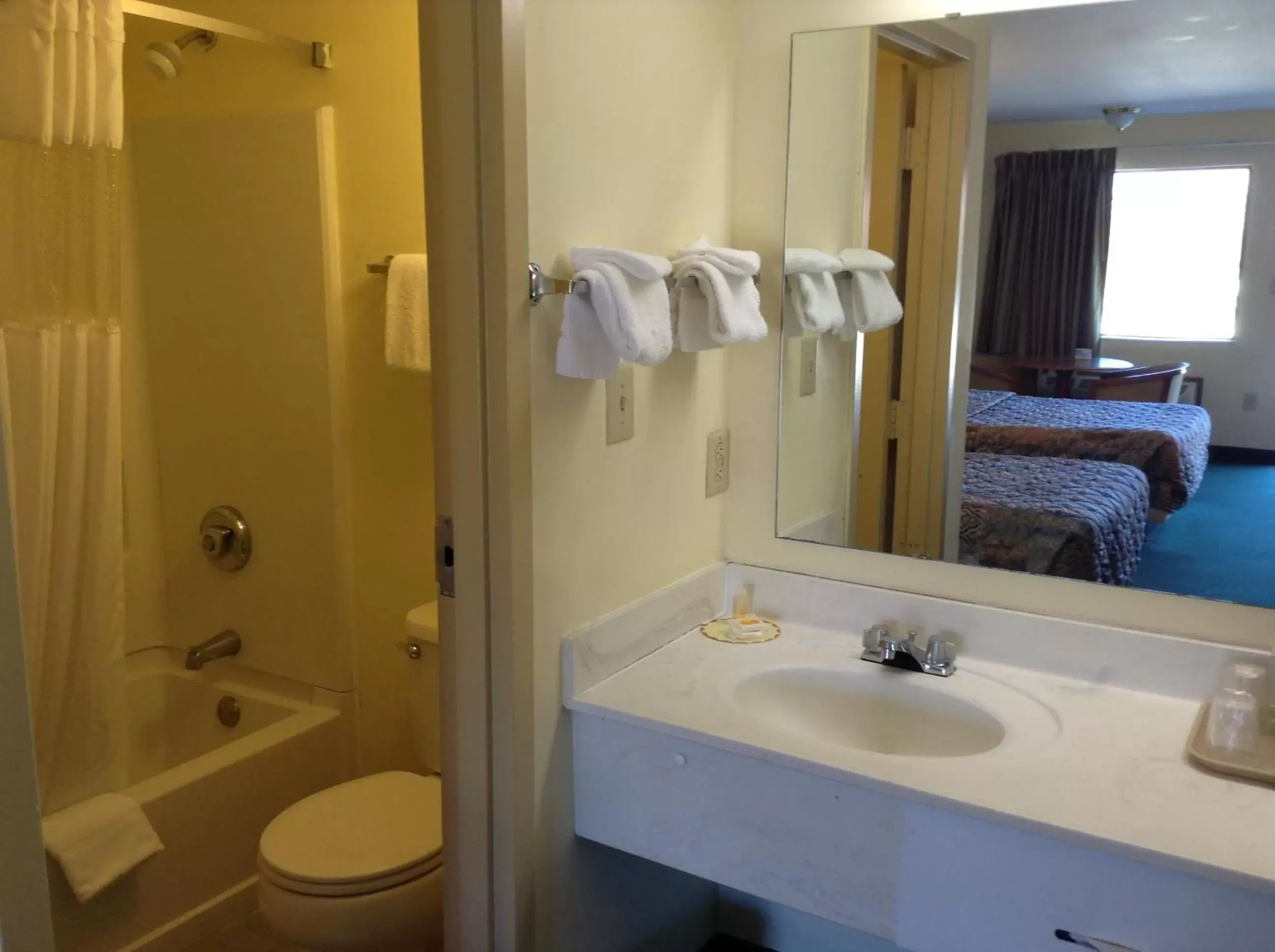Deluxe Queen Room with Two Queen Beds - Non-Smoking in Days Inn & Suites by Wyndham Tucker/Northlake