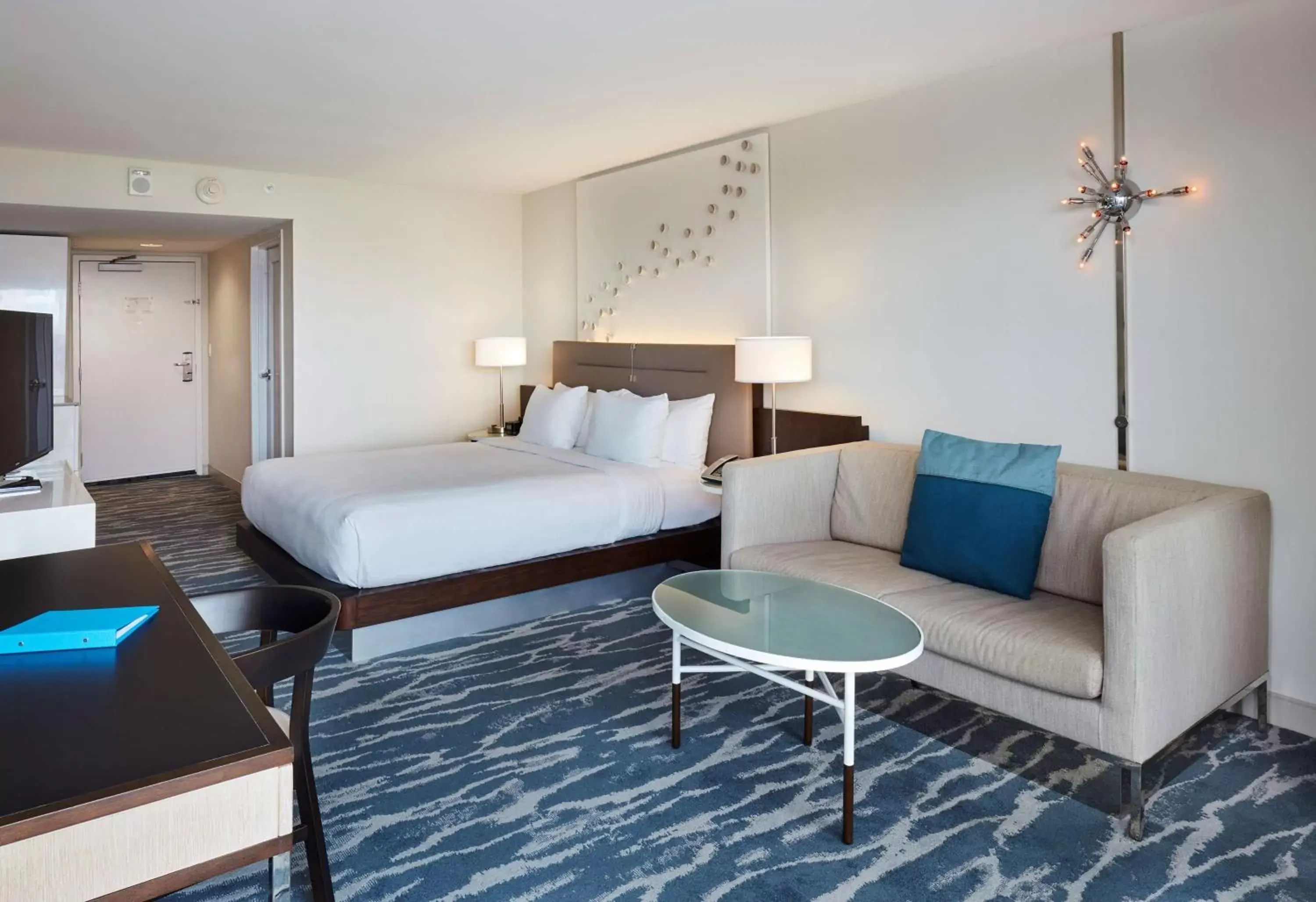 Living room, Bed in Waterstone Resort & Marina Boca Raton, Curio Collection by Hilton