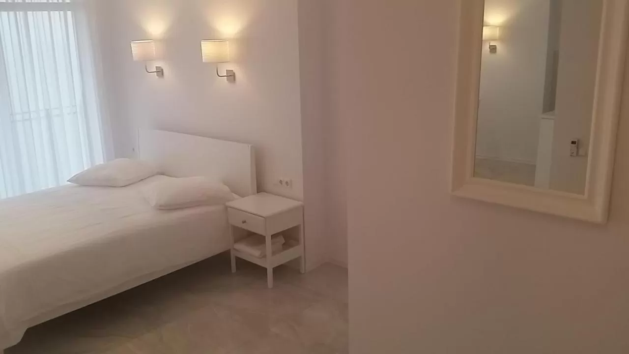 Bed in PURE WELLNESS SEA-VIEW Beluga & Dolphin Luxury HOTEL apartments