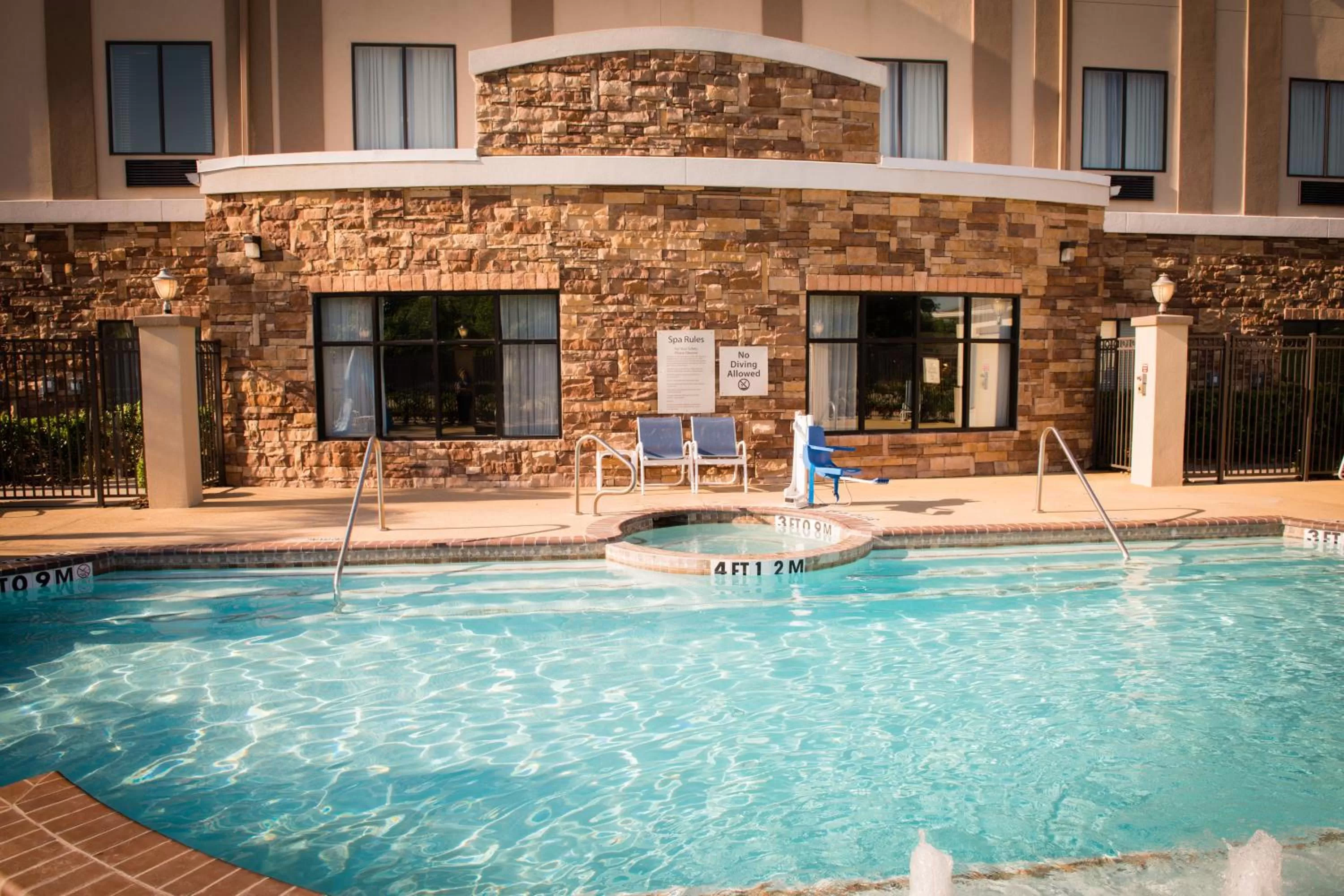 Swimming pool in Holiday Inn Express Hotel & Suites Houston NW Beltway 8-West Road by IHG