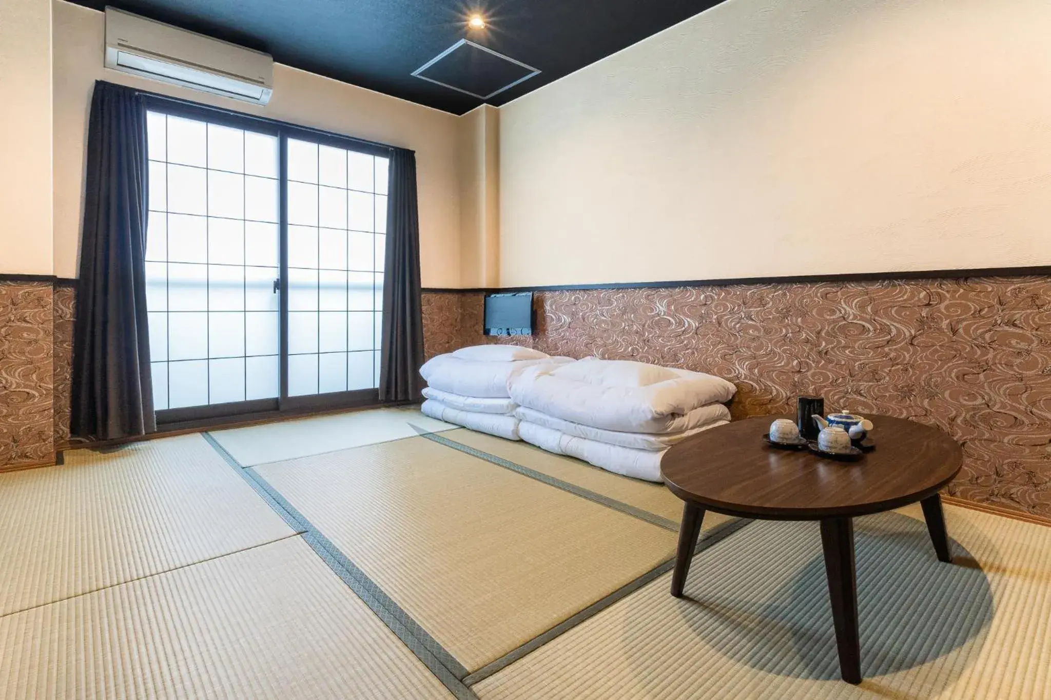 Photo of the whole room, Bed in Tabist Sparkling Dolphins Inn Kyoto