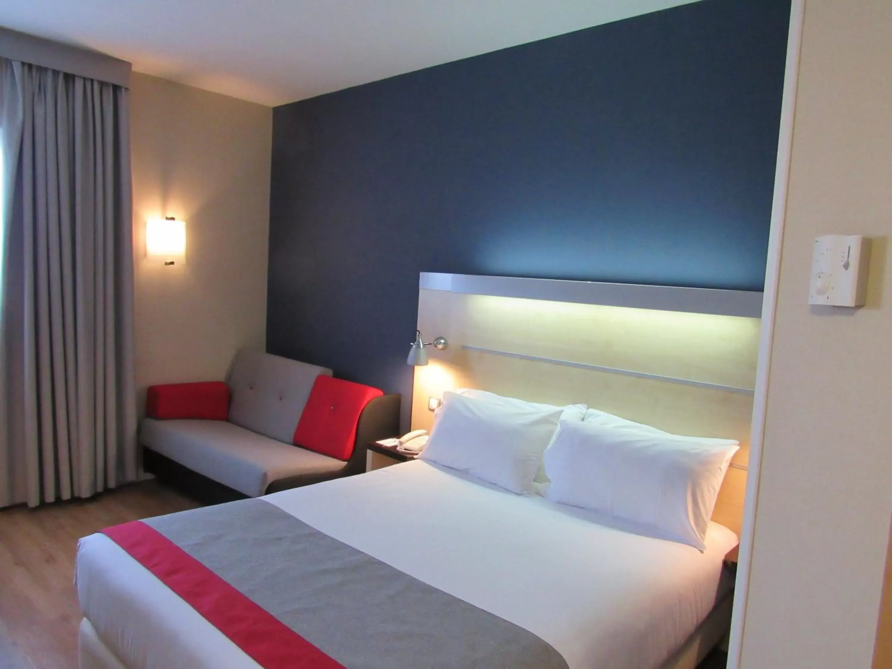 Bed in Holiday Inn Express Madrid-Alcorcón, an IHG Hotel