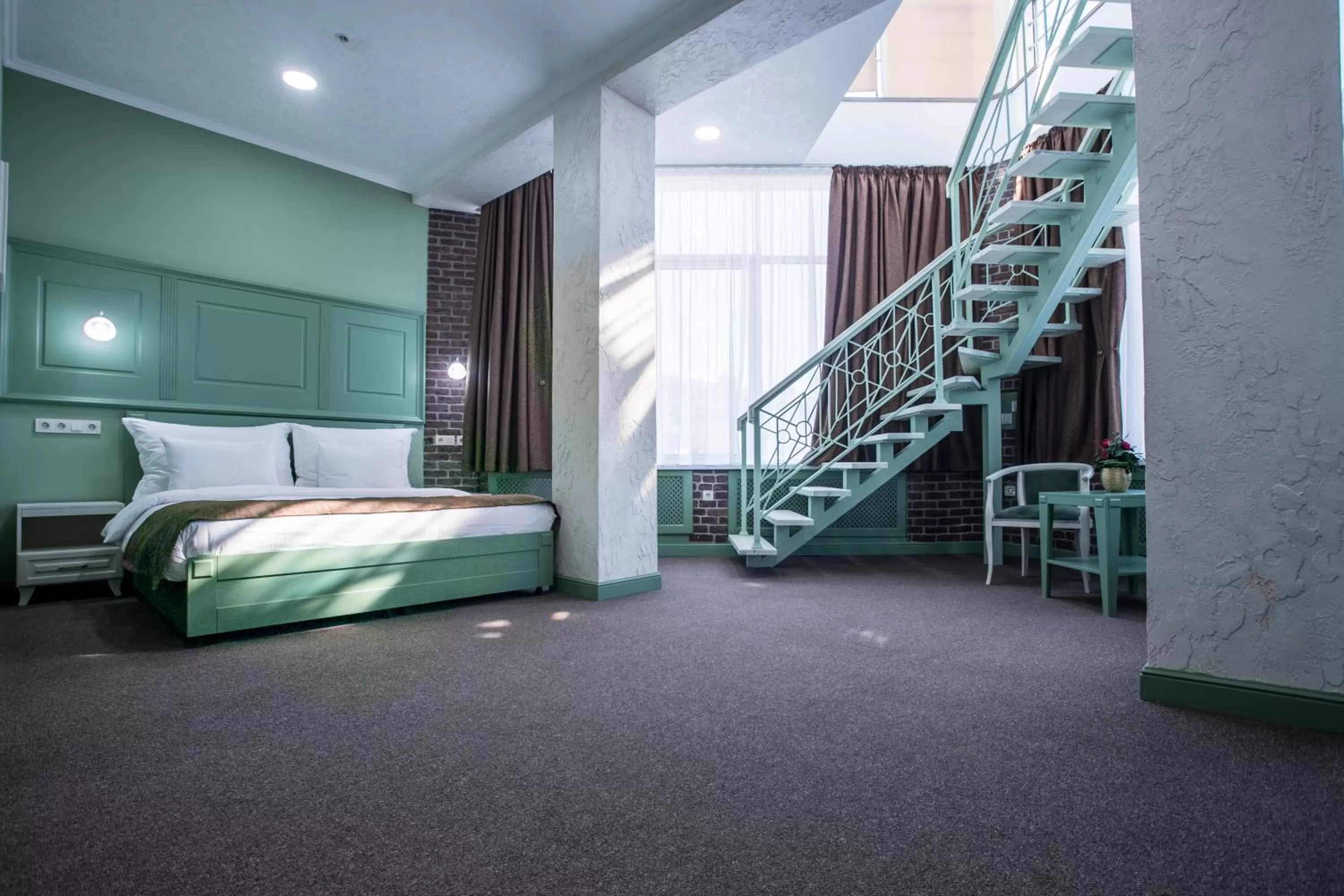 Living room, Bed in Grand Sapphire Hotel