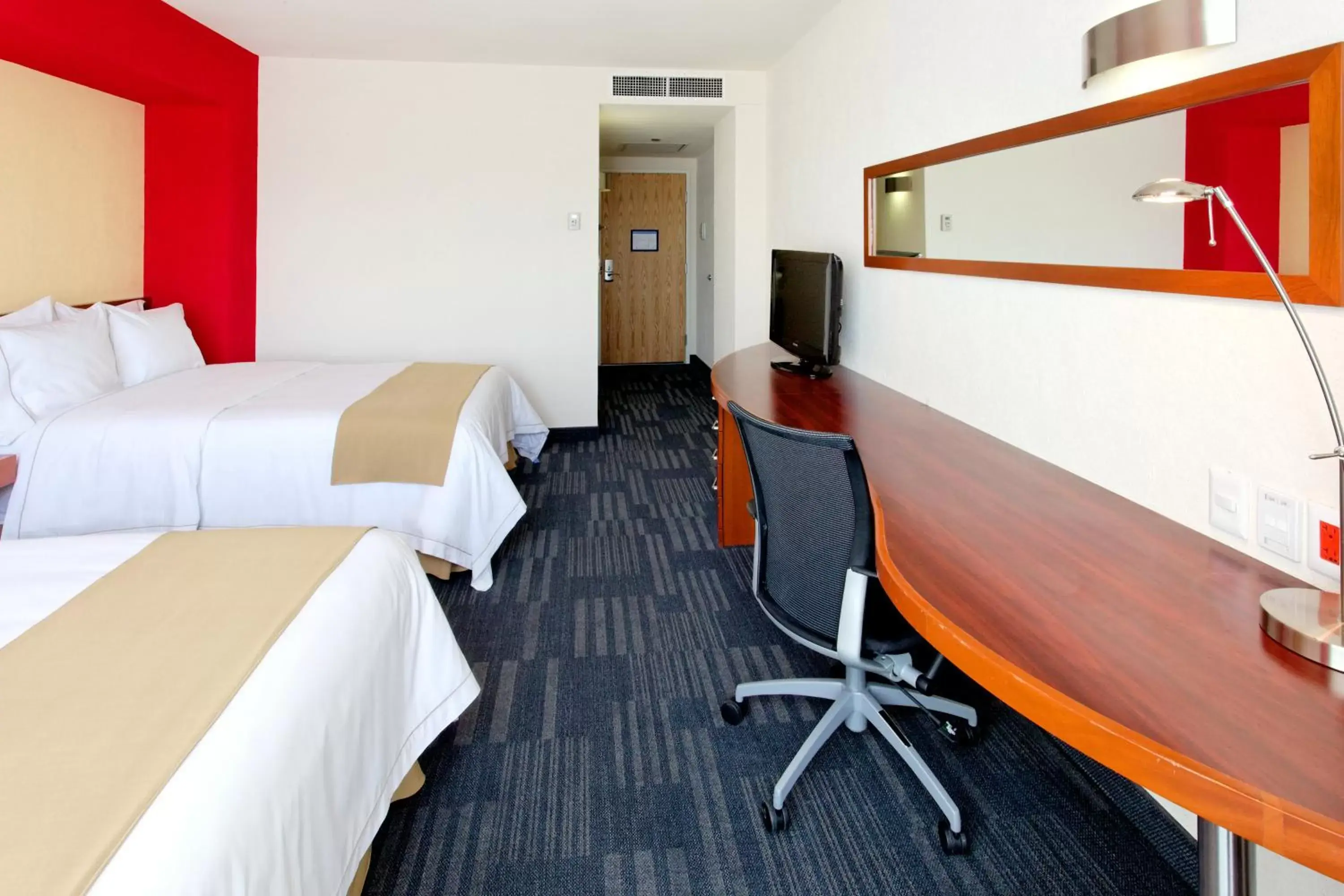 Photo of the whole room in Holiday Inn Express Guadalajara Expo, an IHG Hotel