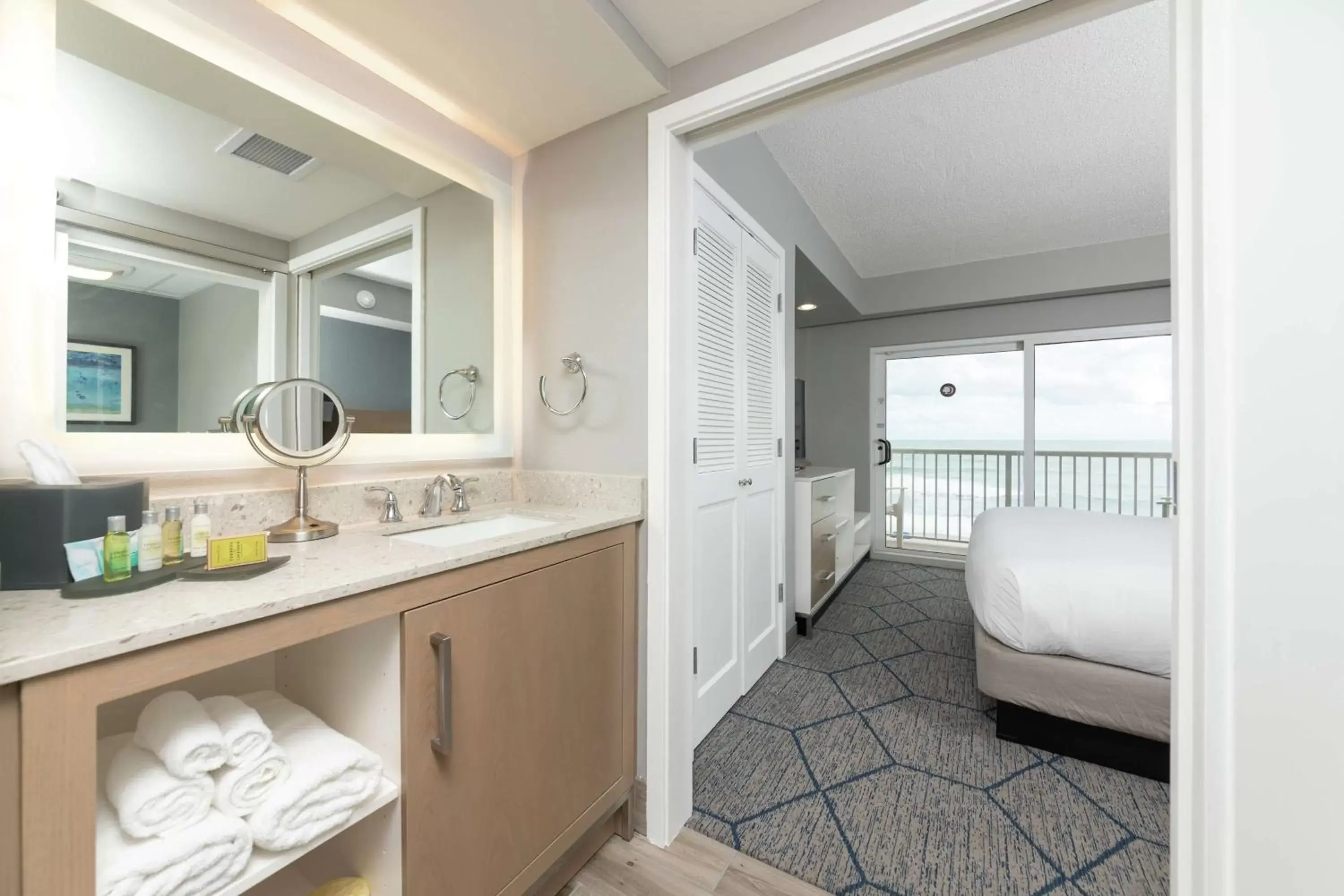 Bed, Bathroom in DoubleTree Suites by Hilton Melbourne Beach Oceanfront