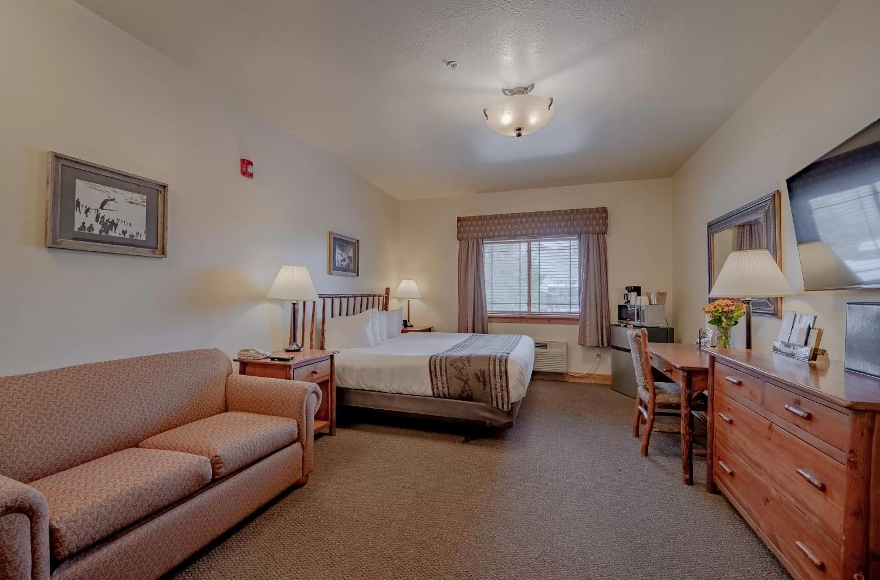 Seating area, Bed in Cowboy Village Resort