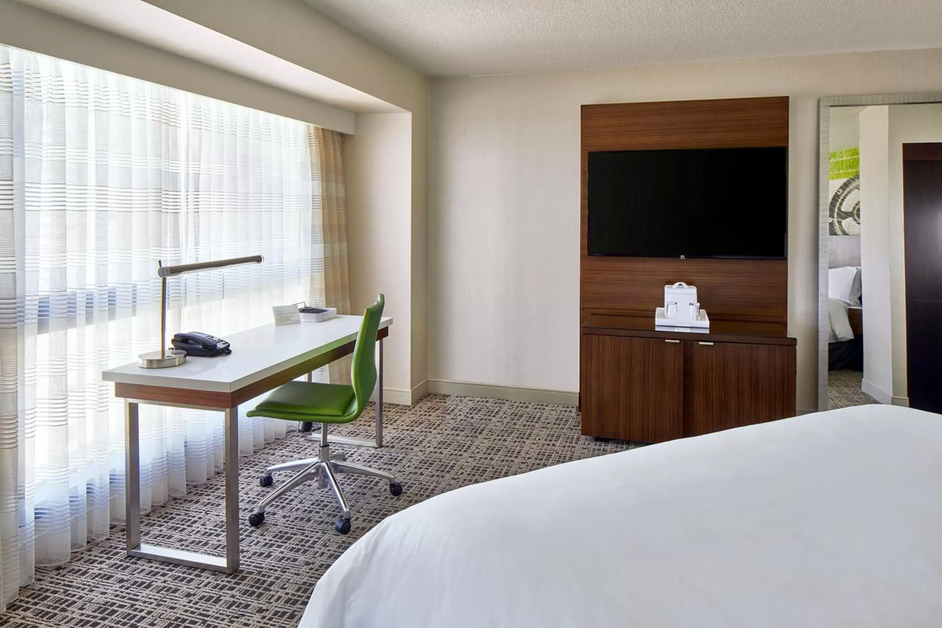 Bedroom, TV/Entertainment Center in Renaissance Nashville Hotel