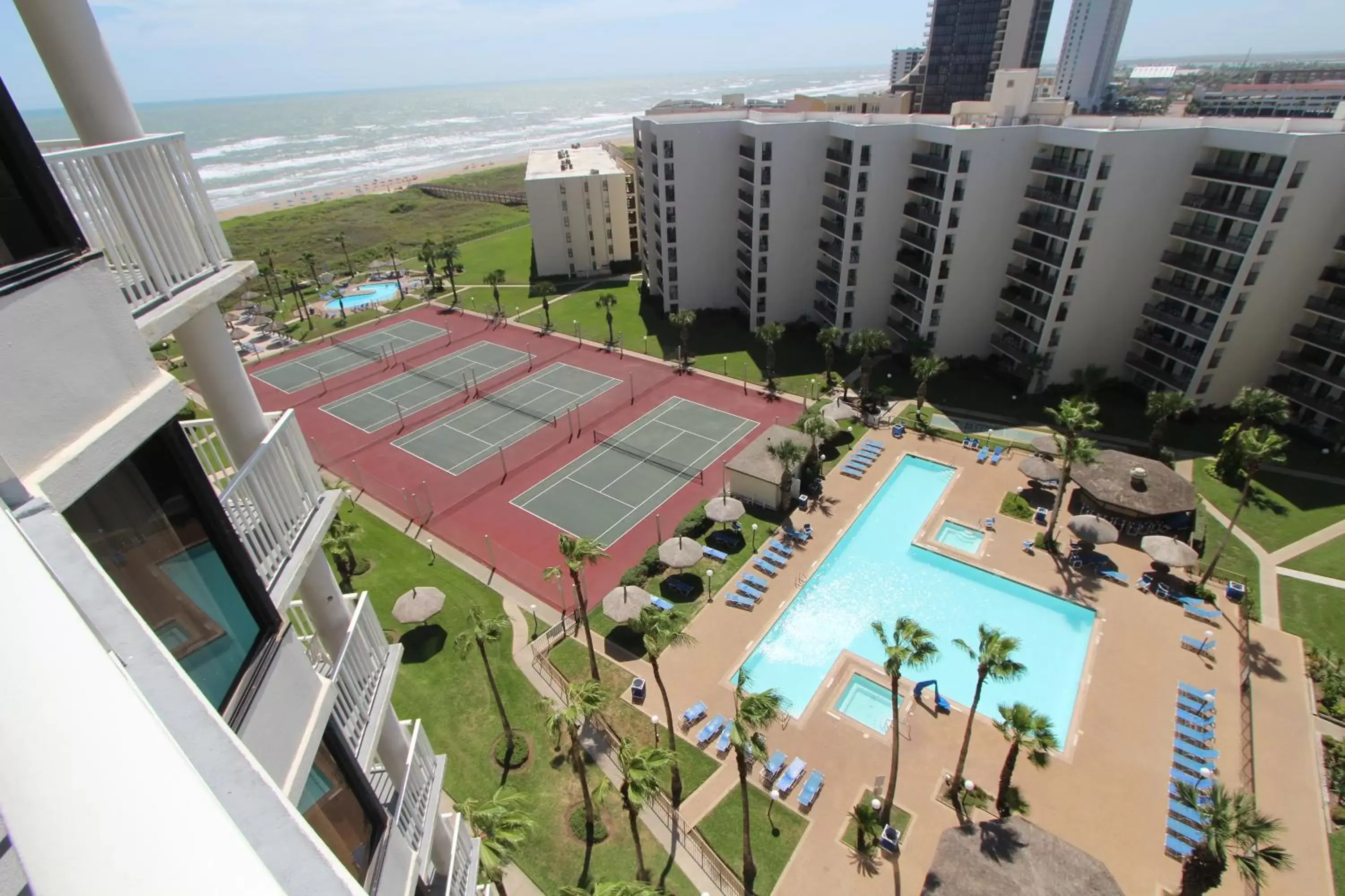 Tennis court, Bird's-eye View in Royale Beach and Tennis Club, a VRI resort