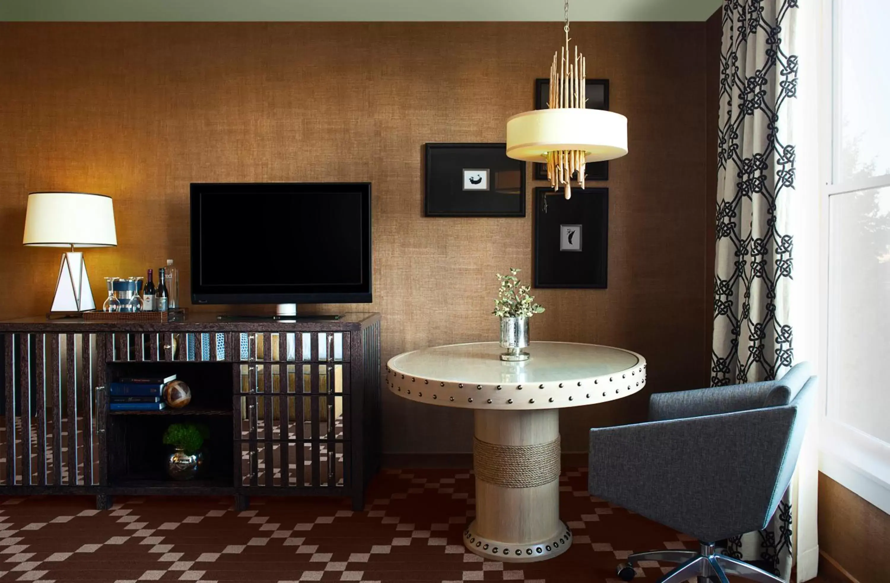 Photo of the whole room, TV/Entertainment Center in Kimpton Riverplace Hotel, an IHG Hotel