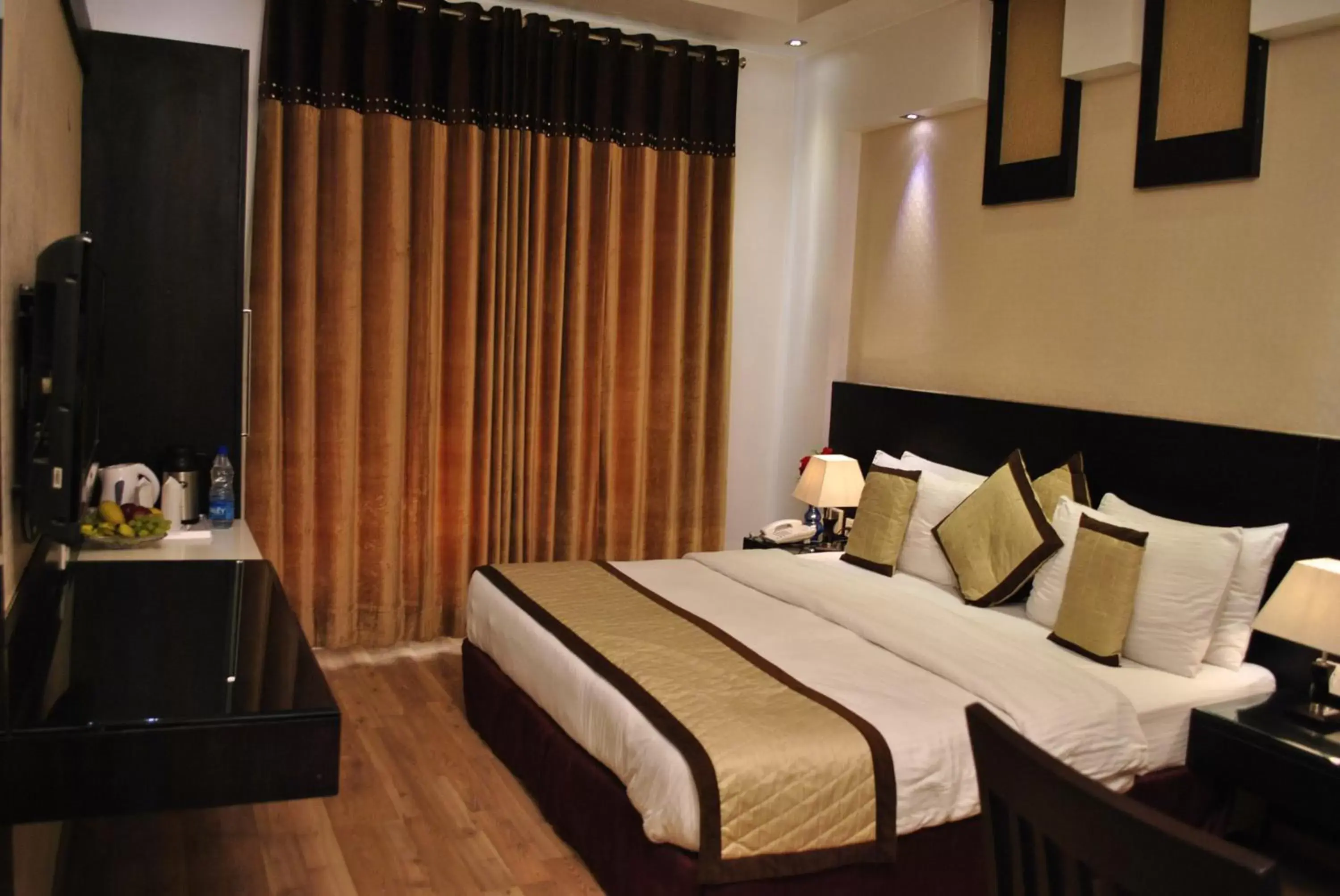 Photo of the whole room, Bed in Hotel Krishna - By RCG Hotels