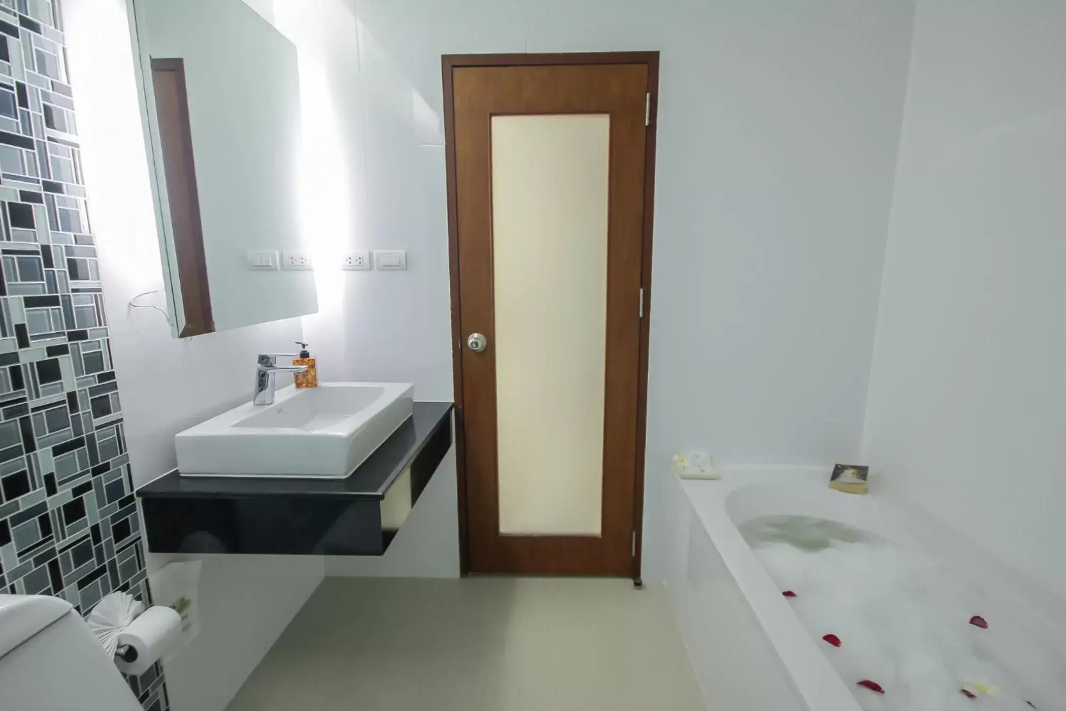 Bathroom in Baan Nilrath Hotel - SHA Extra Plus