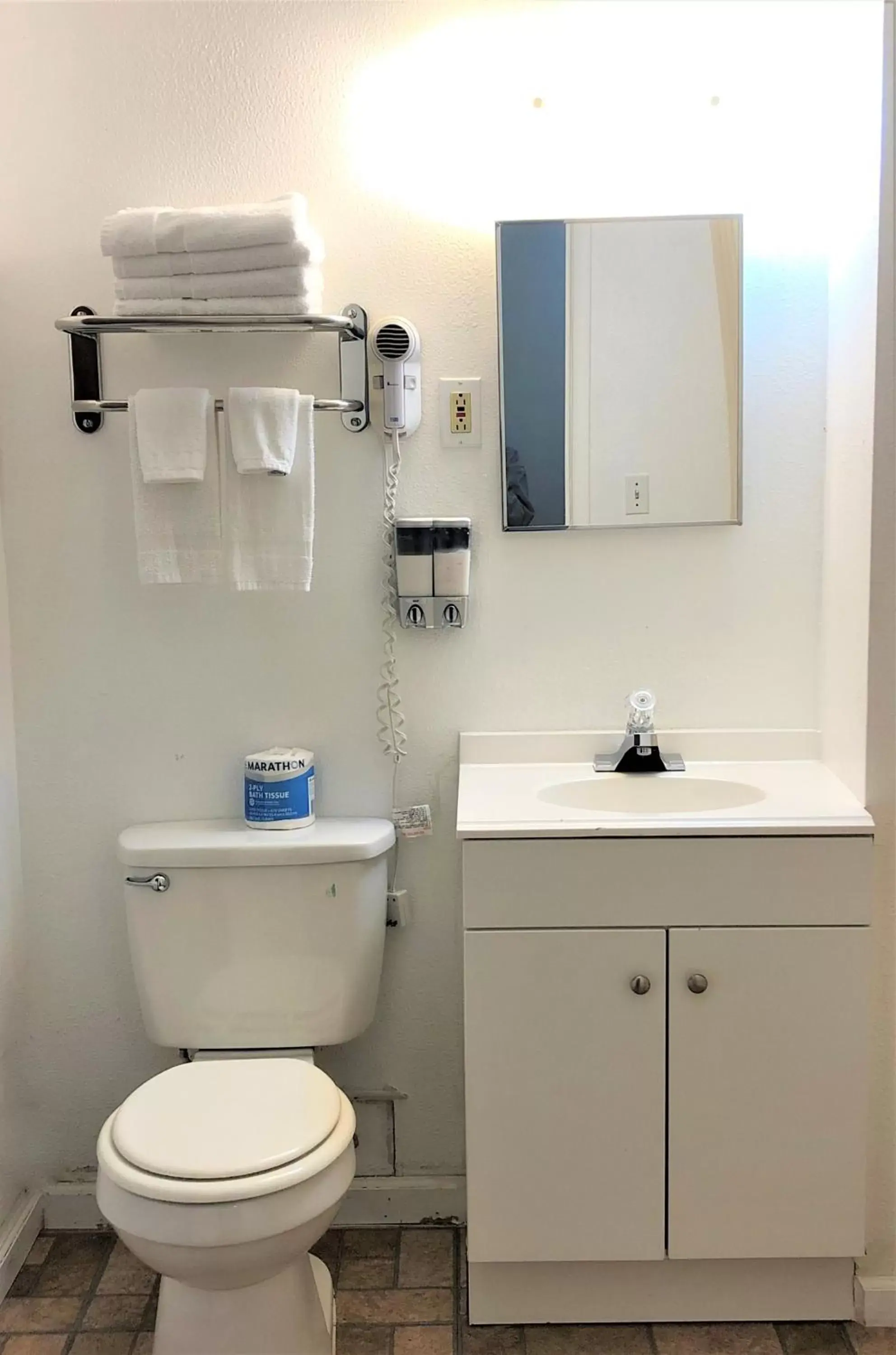 Toilet, Bathroom in Blue Coast Inn & Suites