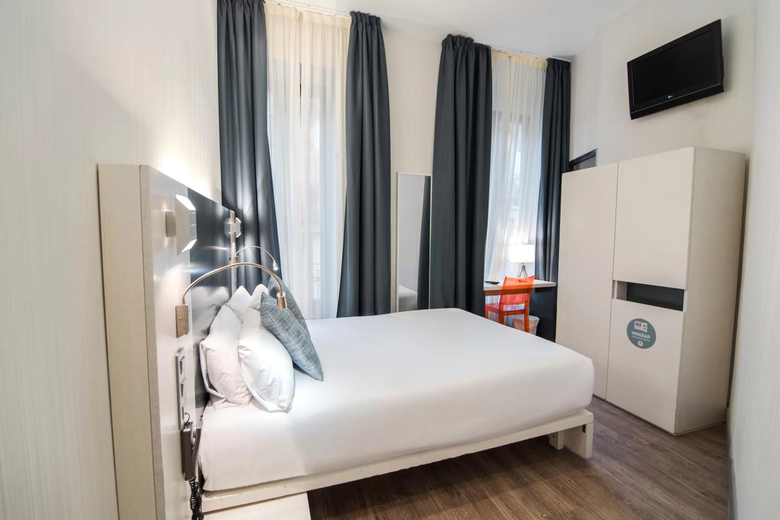 Bed in Petit Palace Canalejas Sevilla