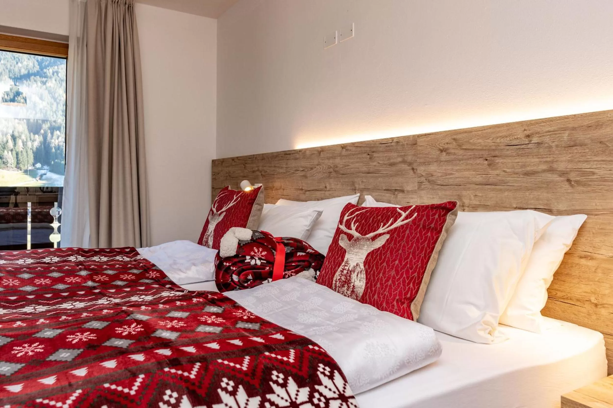 Bed in Hotel Kronplatzer Hof