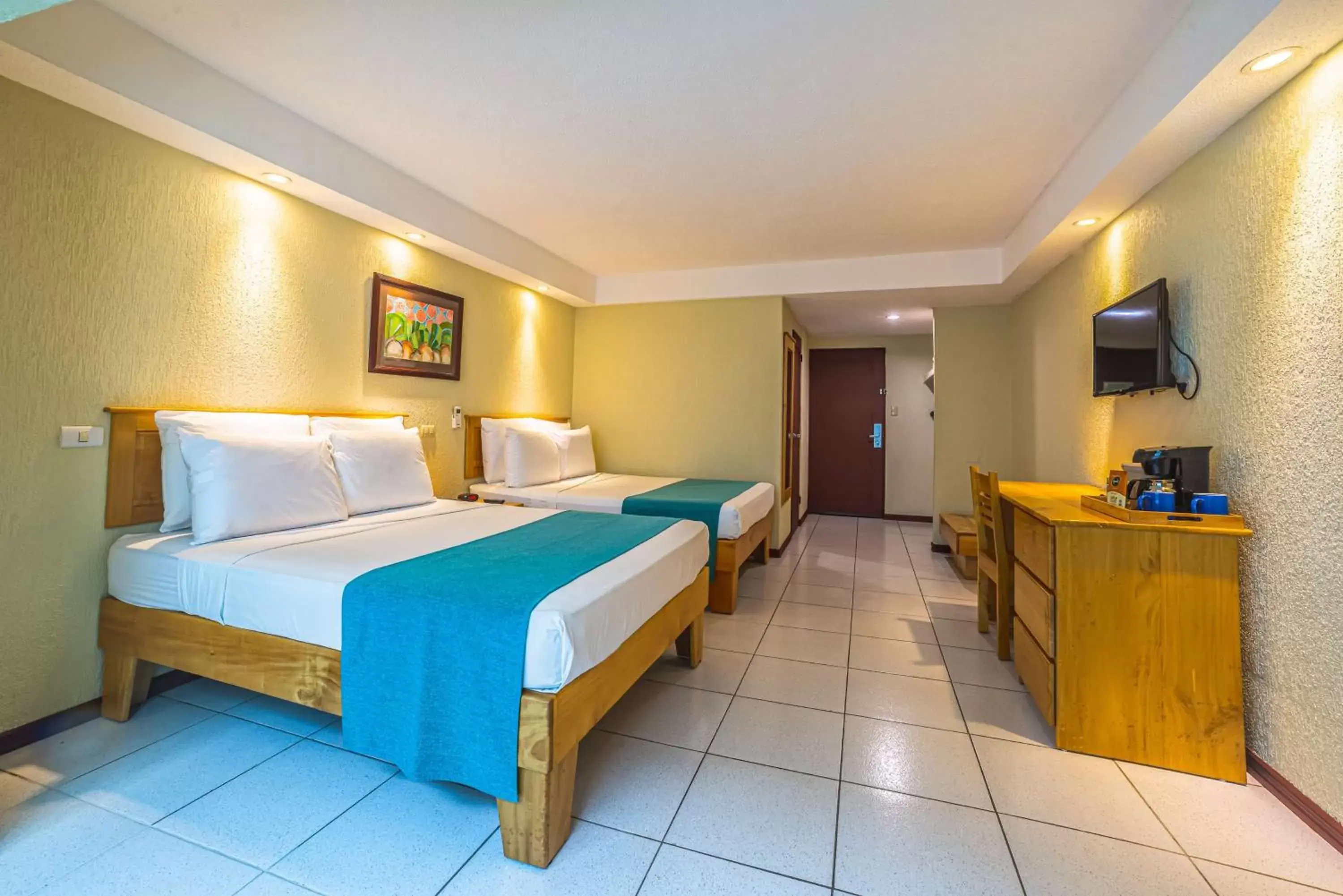 Bedroom in Best Western Jaco Beach All Inclusive Resort