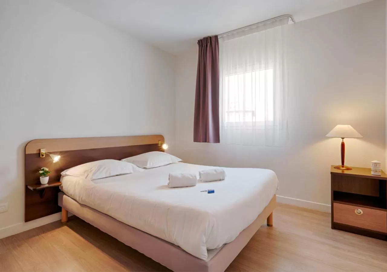 Bed in Zenitude Hôtel-Résidences Béziers Centre