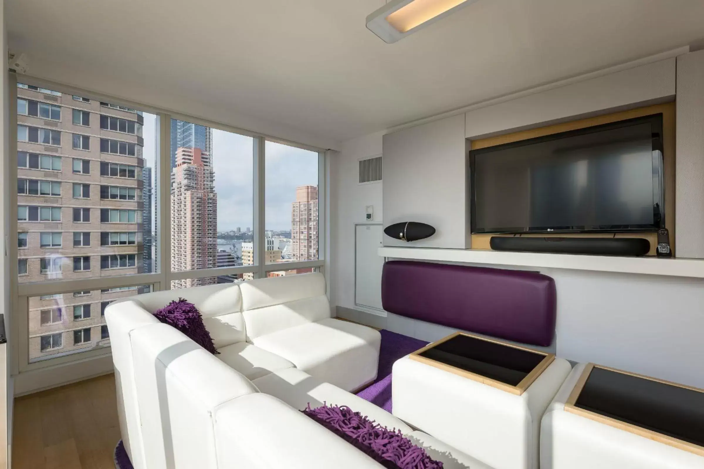 Living room, TV/Entertainment Center in YOTEL New York Times Square