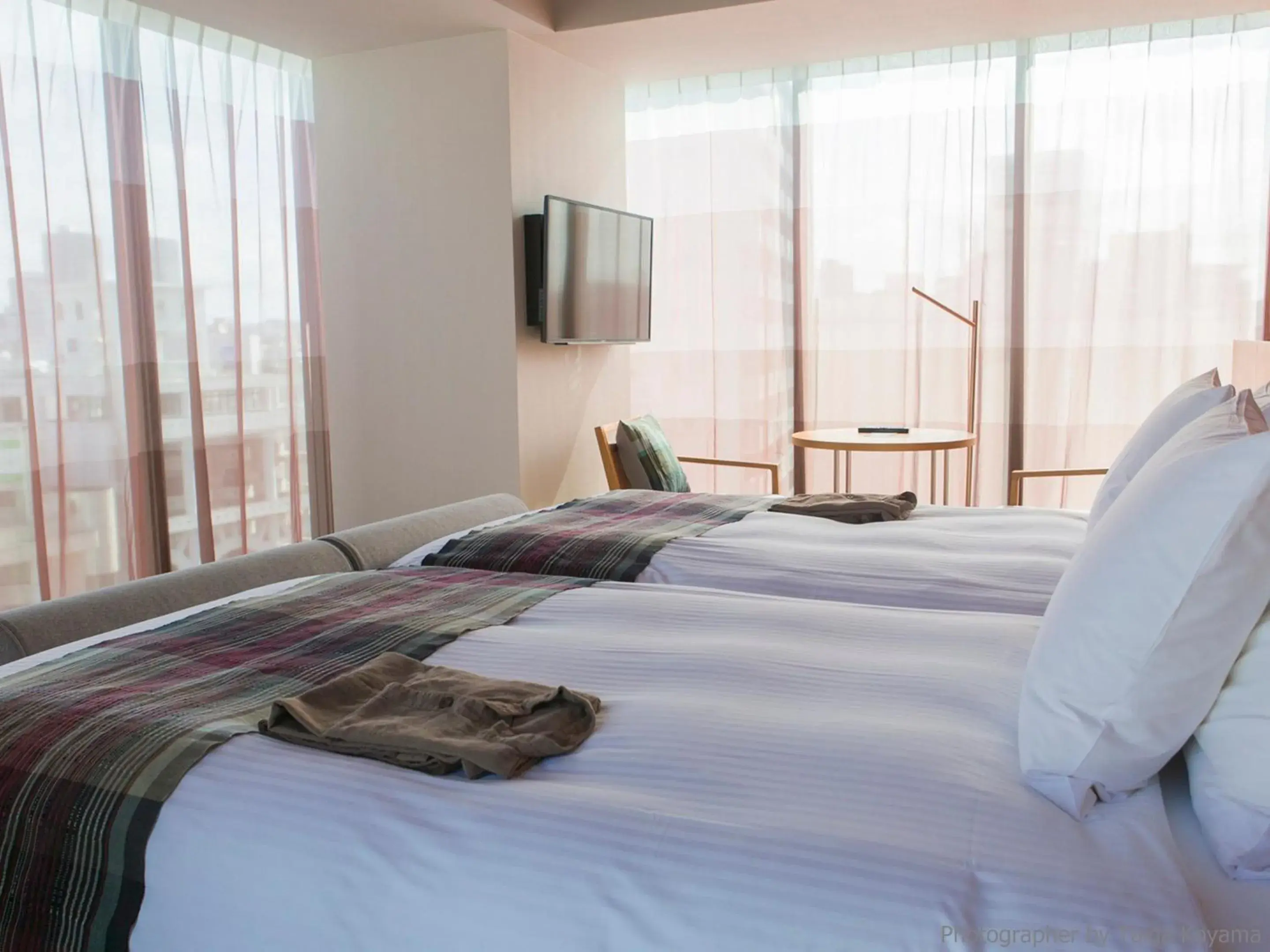 Text overlay, Bed in HOTEL STRATA NAHA