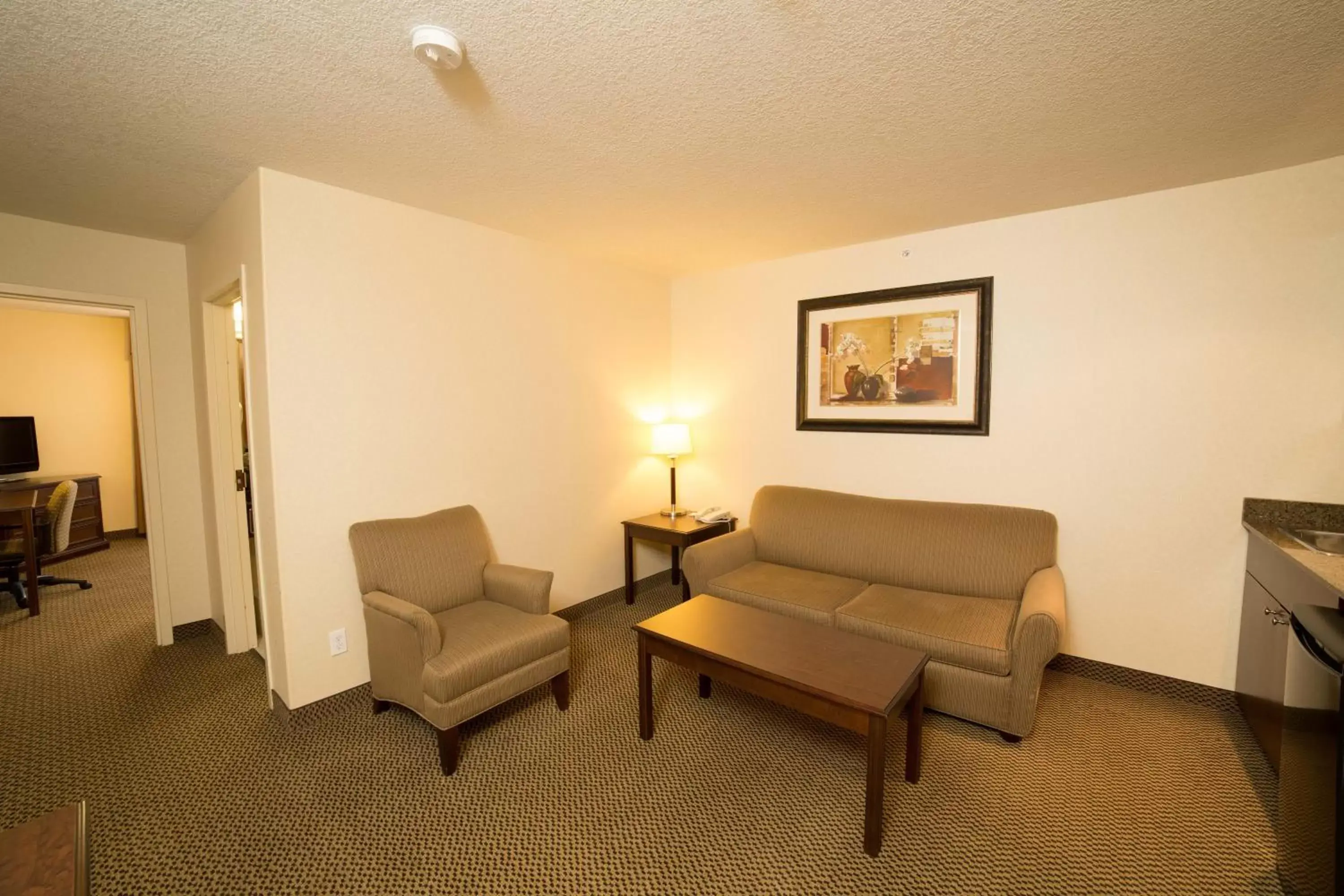 Bedroom, Seating Area in Holiday Inn Express Hotel & Suites - Slave Lake, an IHG Hotel