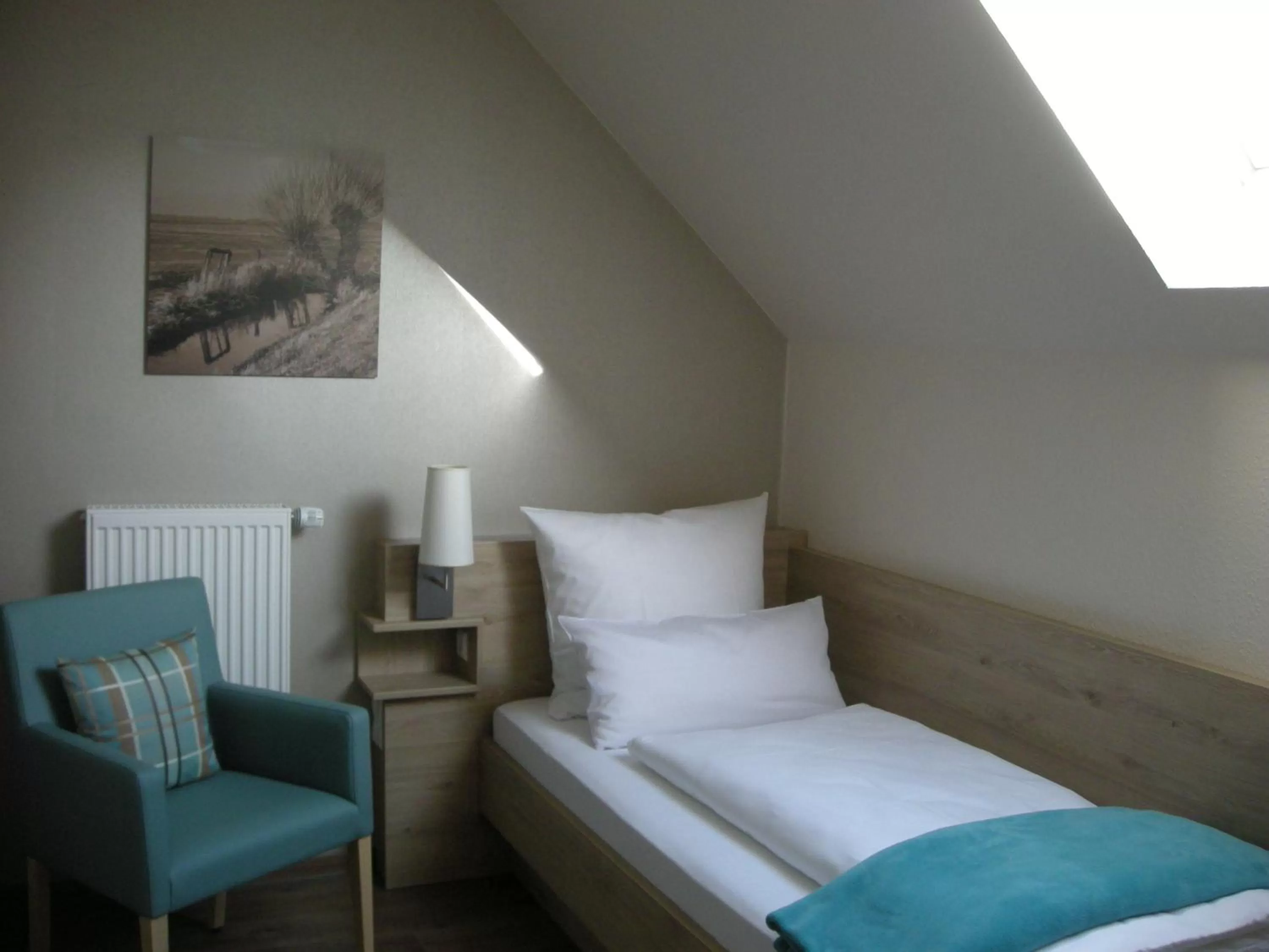 Seating area, Bed in Gästehaus Rothert