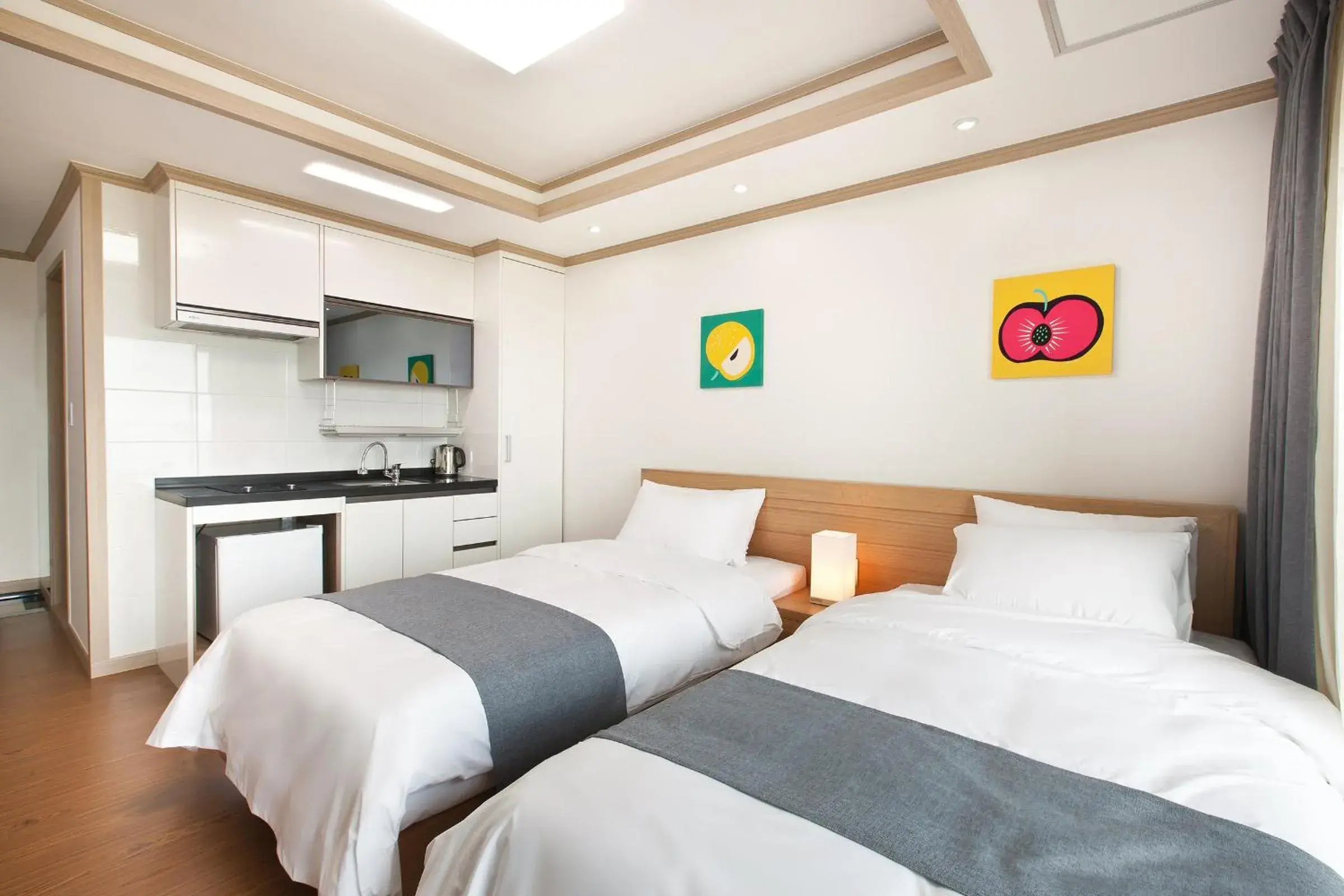 Photo of the whole room, Bed in Familia Hotel Jeju