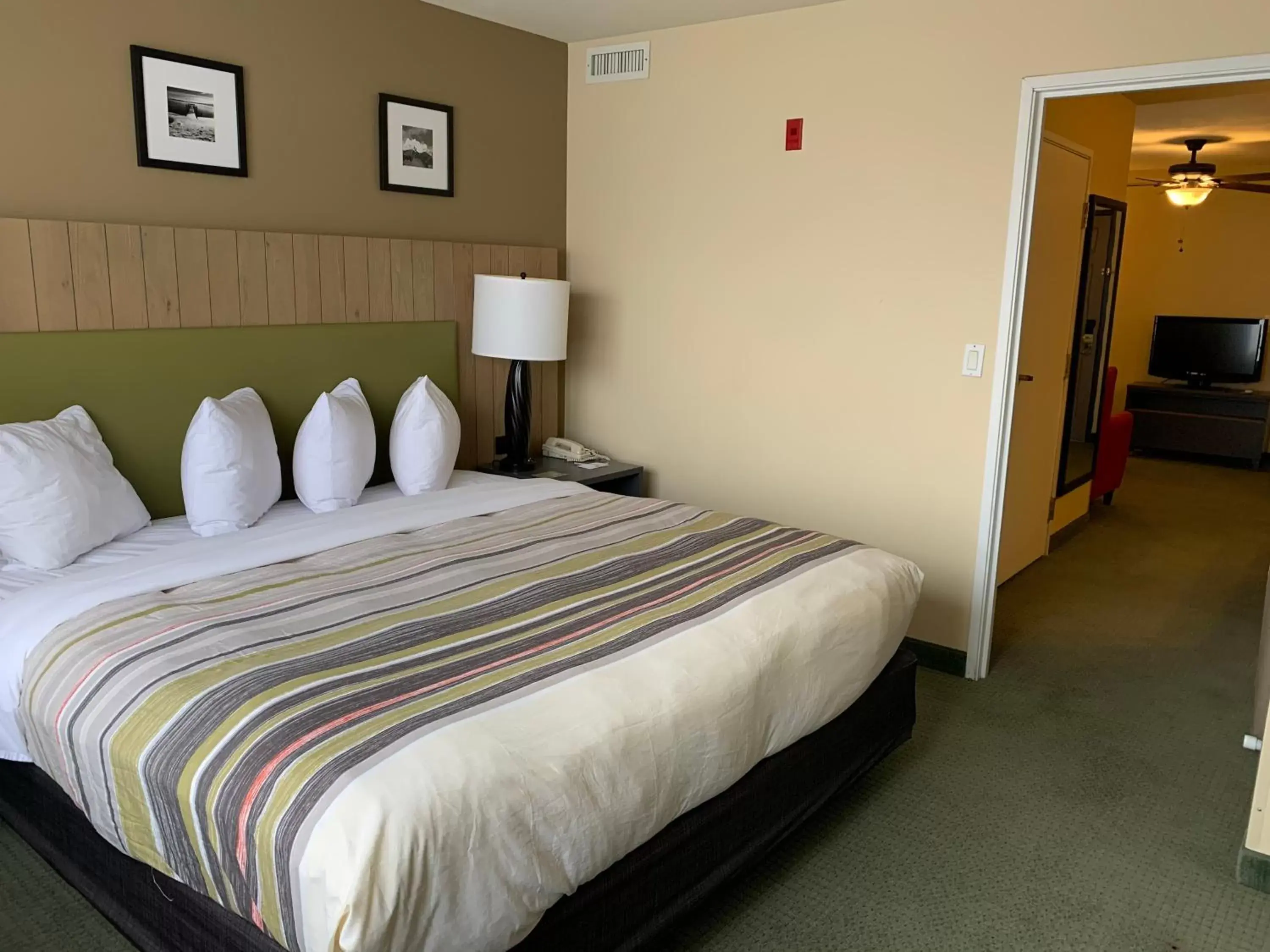 Bed in Country Inn & Suites by Radisson, West Valley City, UT