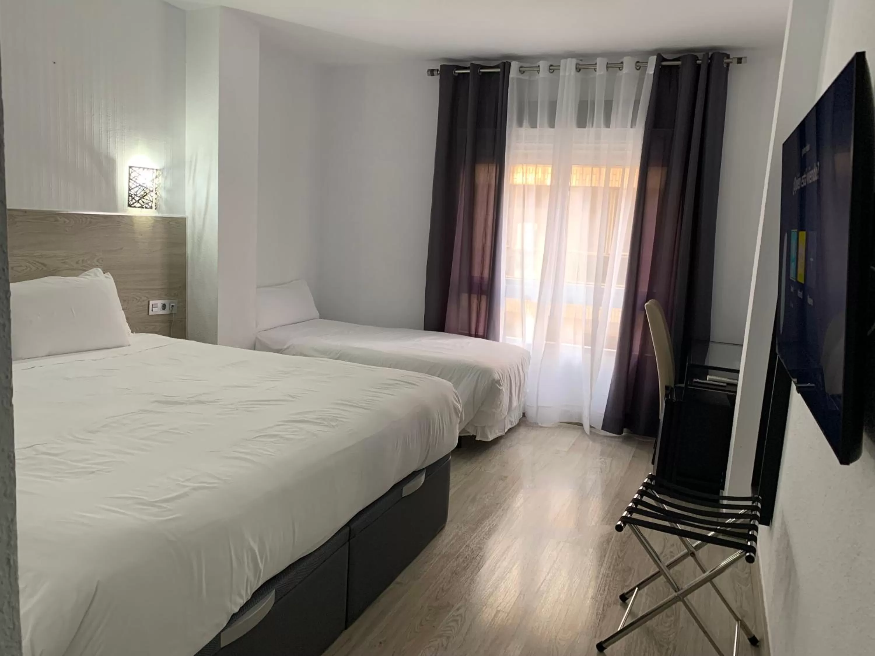 Bed in Hotel Carlos III