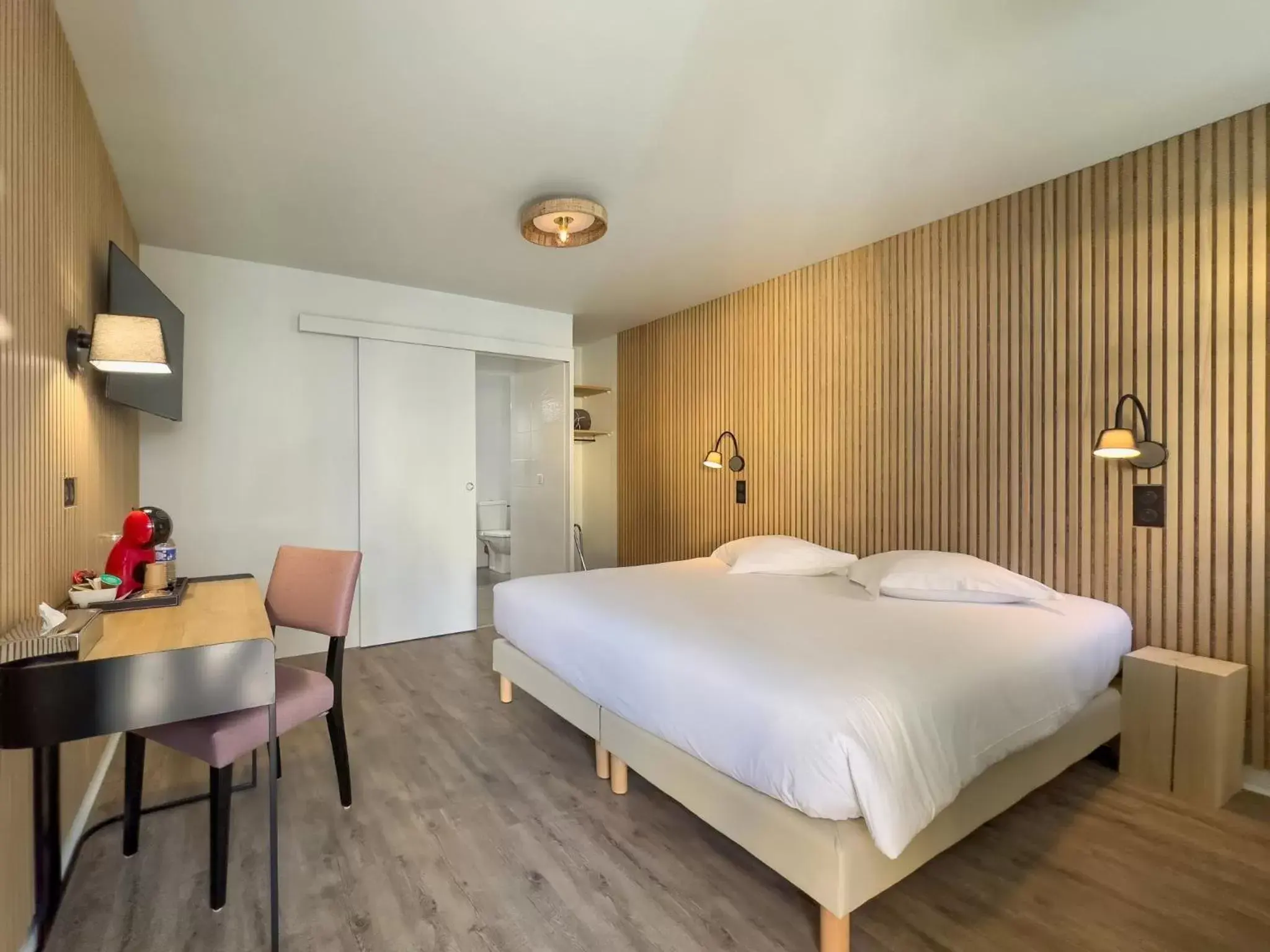 Bed in Hotel De La Gare