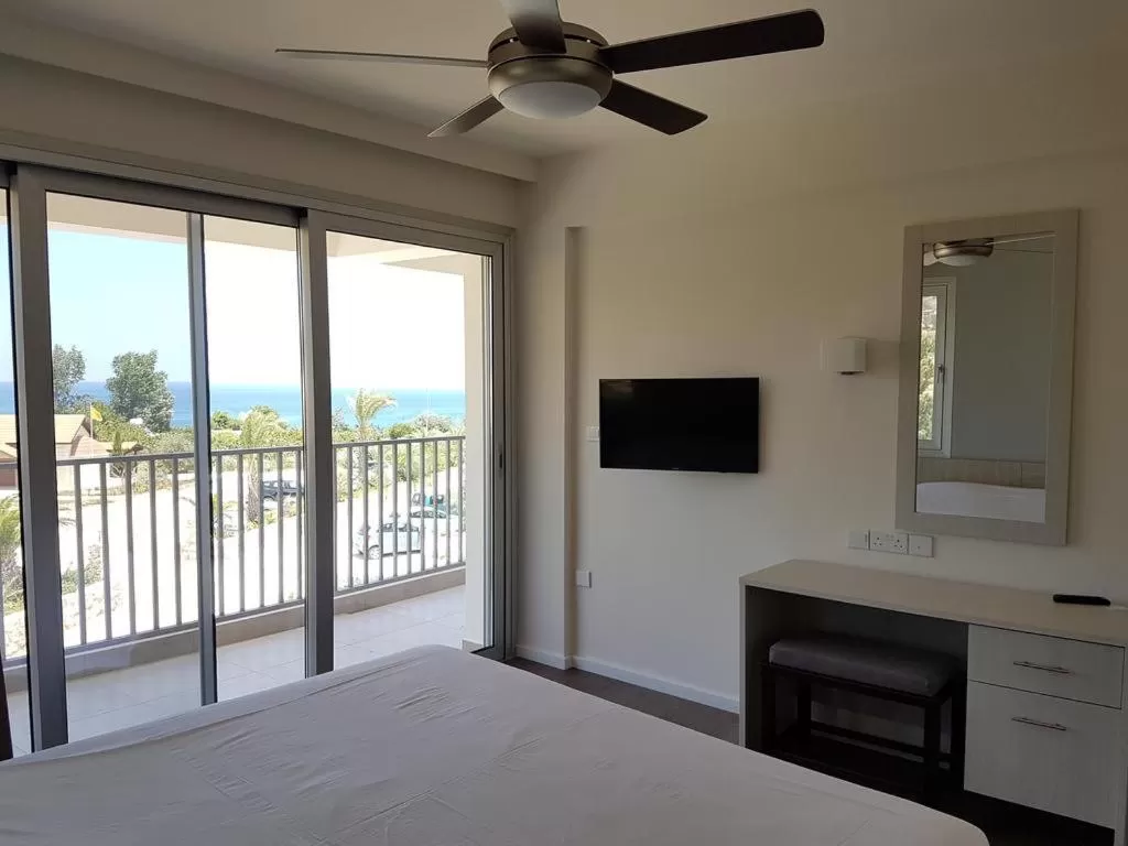 Bed in Aphrodite Beach Hotel