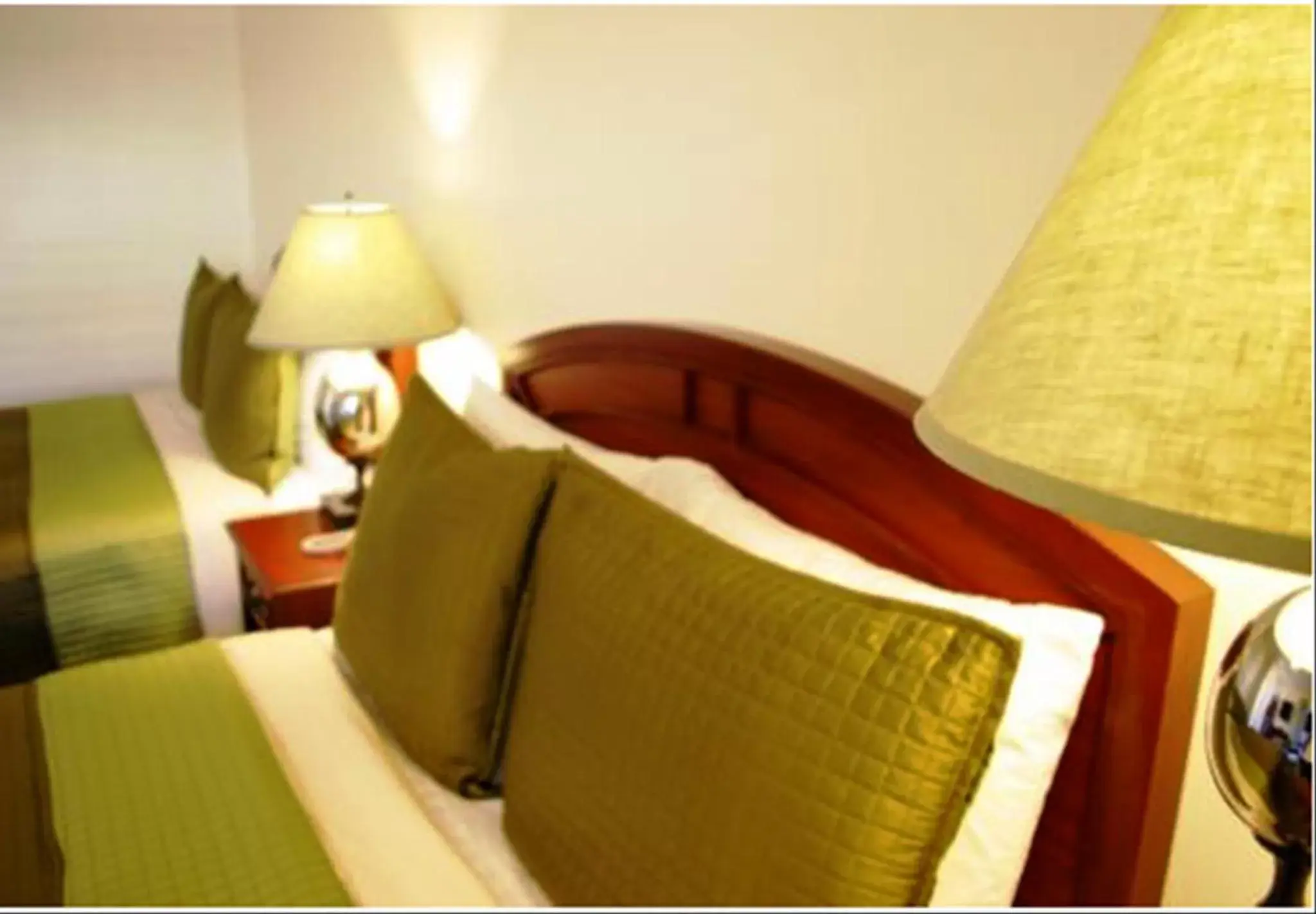 Decorative detail, Bed in Bella Capri Inn and Suites