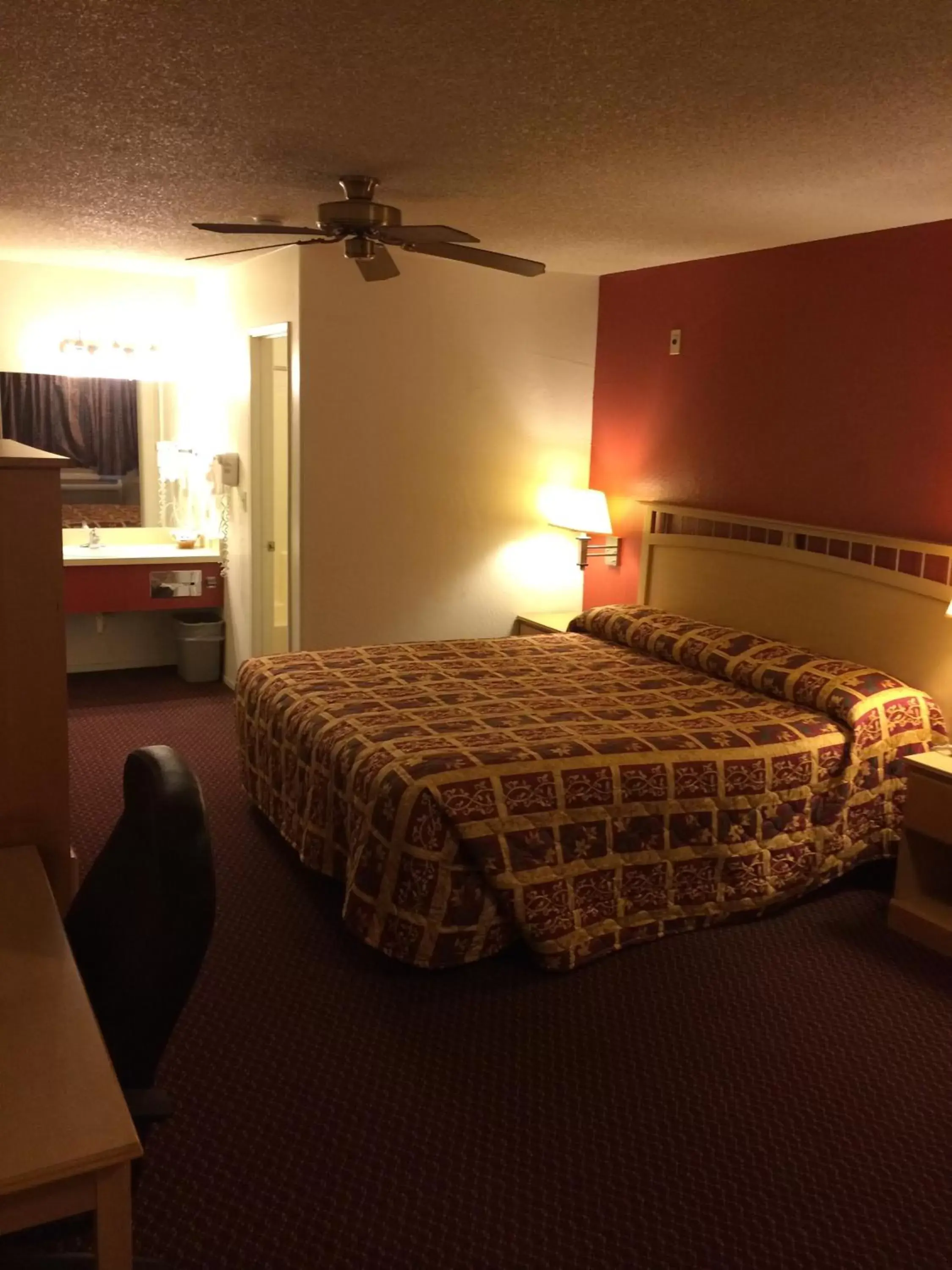 Bed in Value Inn & Suites