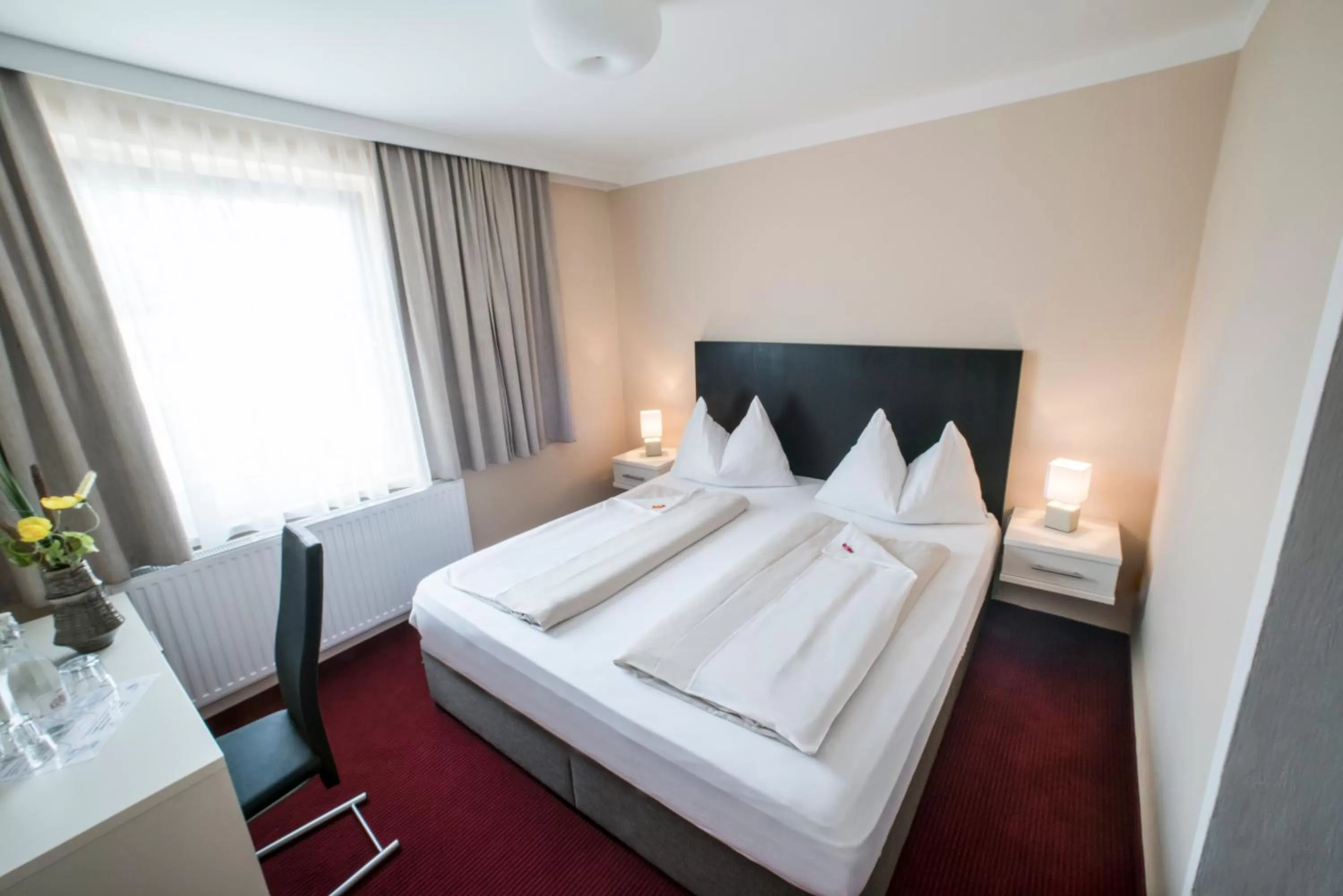 Bed in Stadthotel Kramer