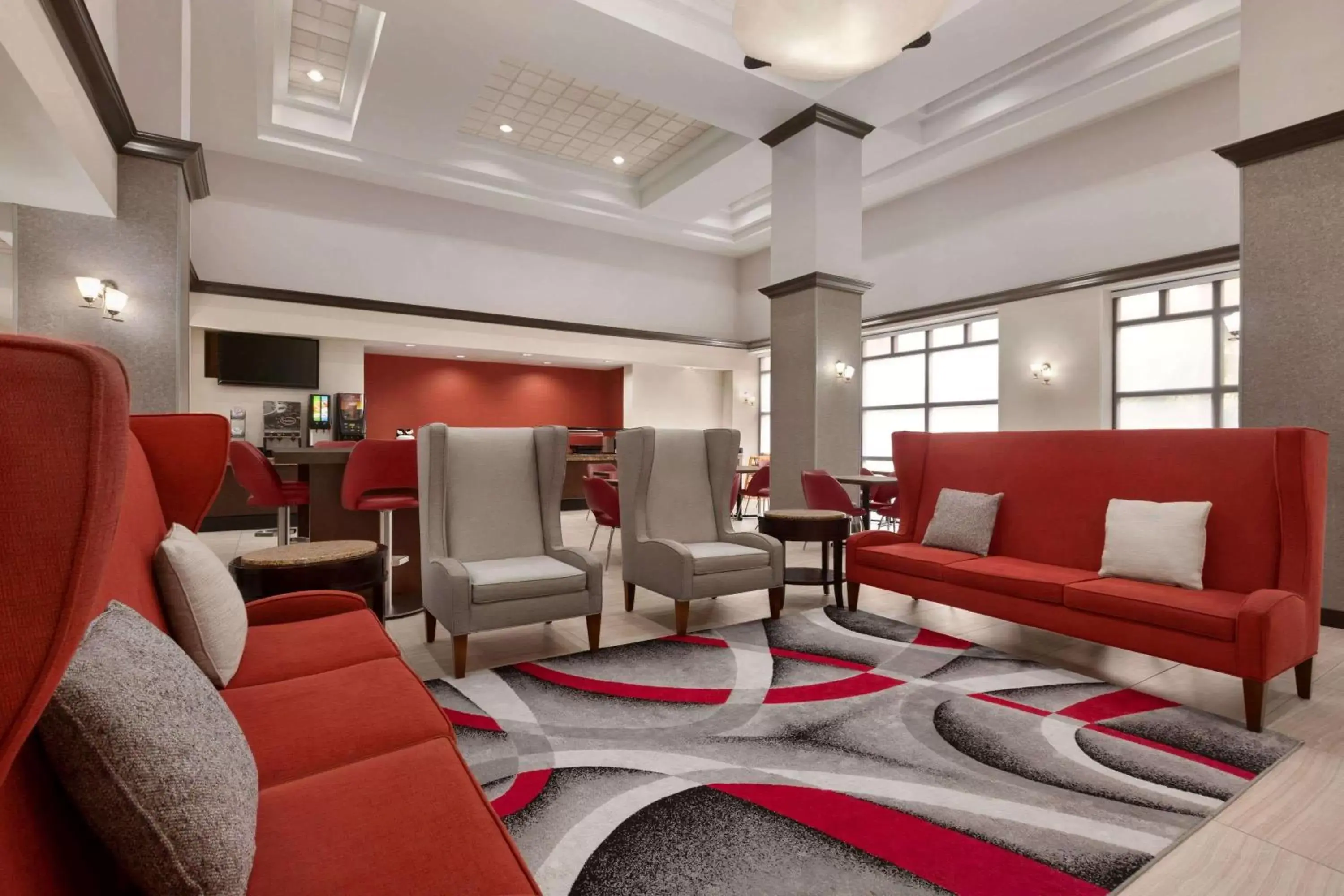 Lobby or reception, Seating Area in Ramada by Wyndham Suites Orlando Airport