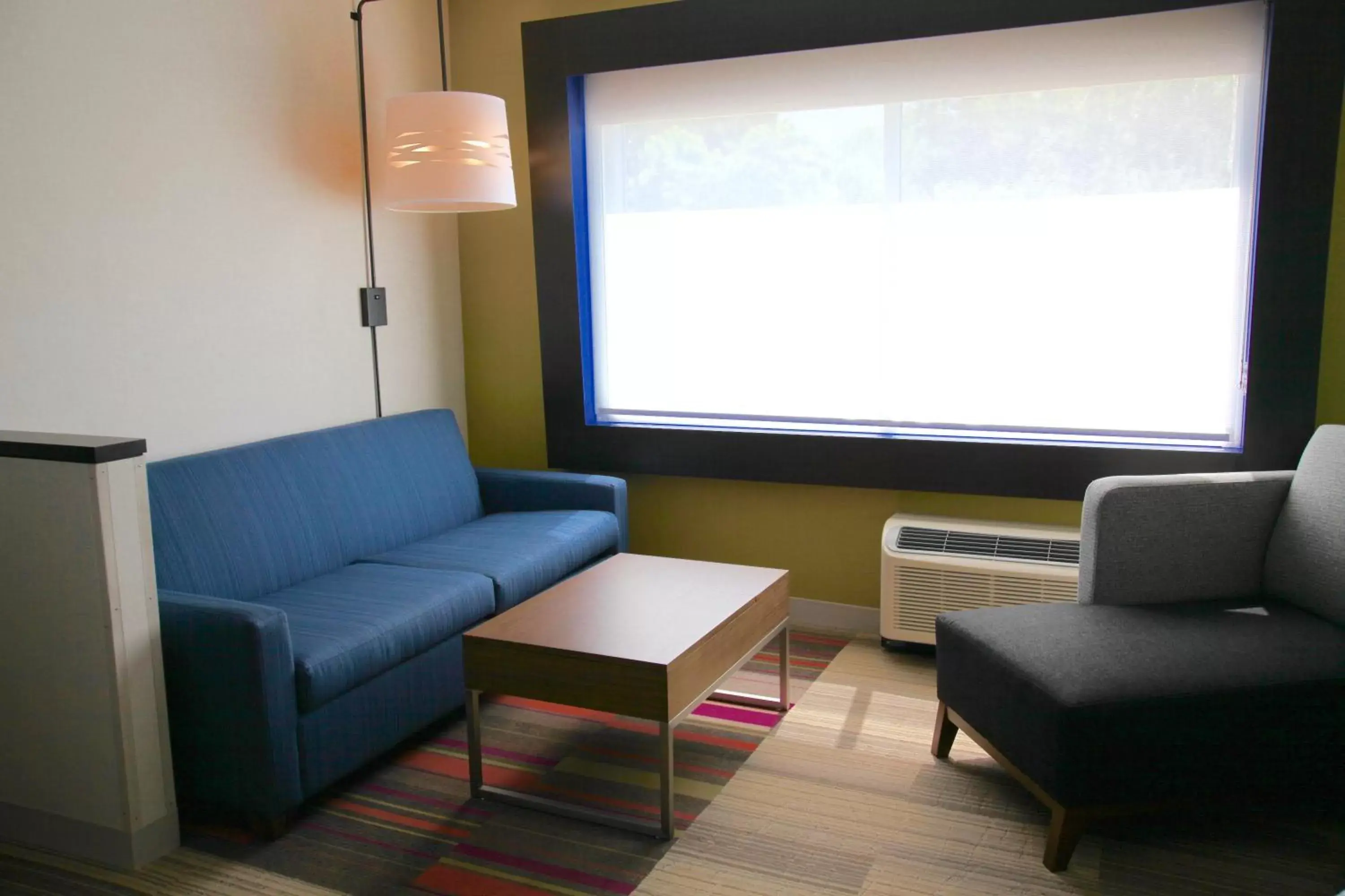 Photo of the whole room, Seating Area in Holiday Inn Express & Suites Oswego, an IHG Hotel