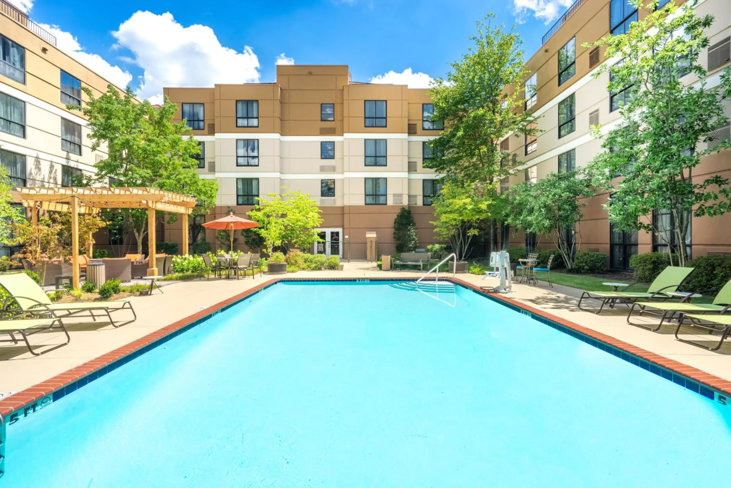 Swimming Pool in Staybridge Suites Memphis-Poplar Ave East, an IHG Hotel