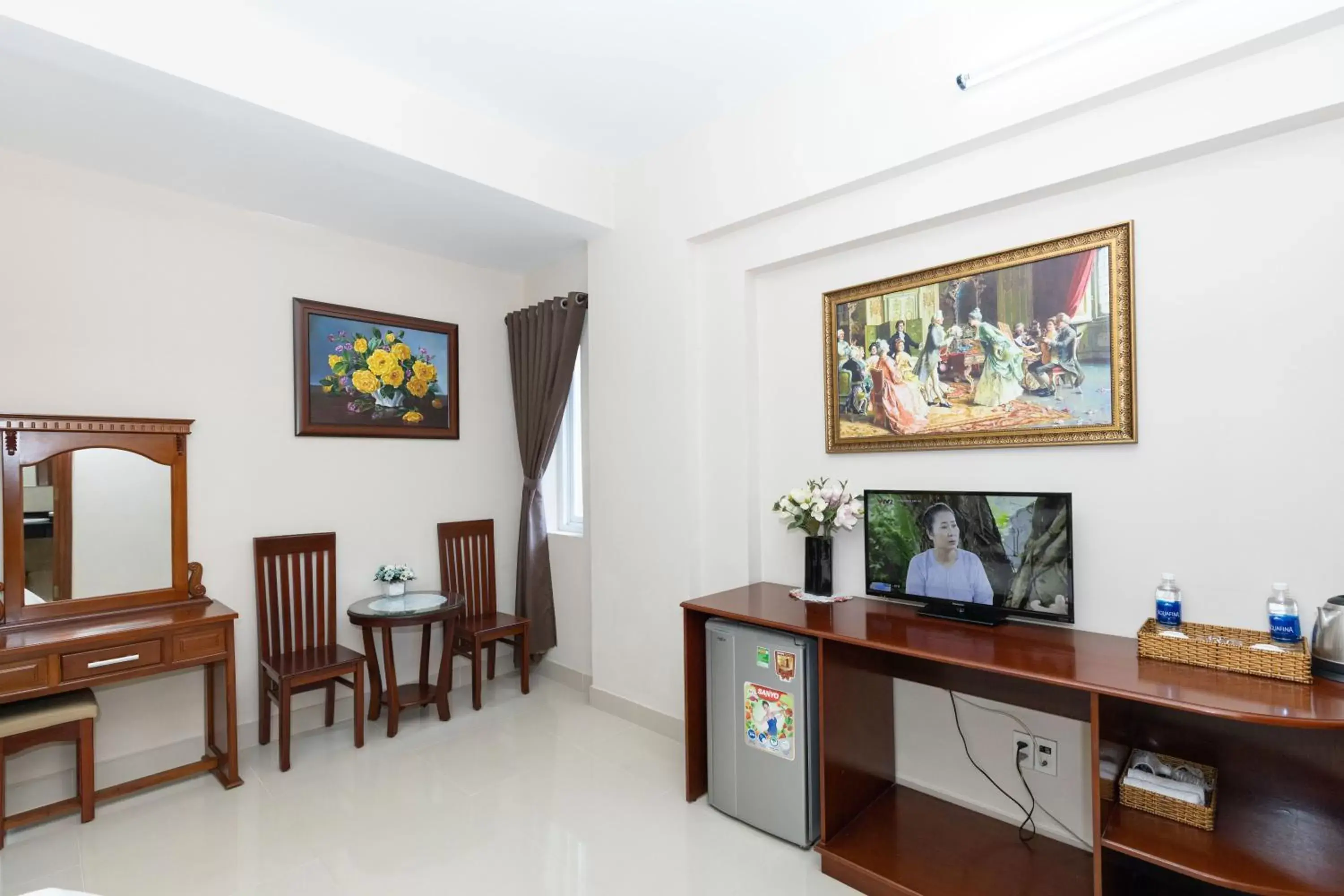 TV and multimedia, TV/Entertainment Center in Queen Garden Hotel & Apartment