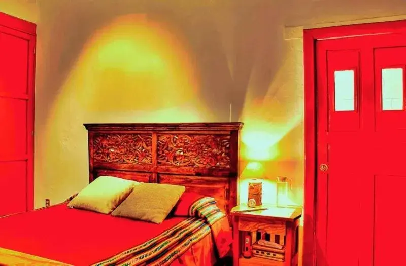 Photo of the whole room, Bed in El Zopilote Mojado