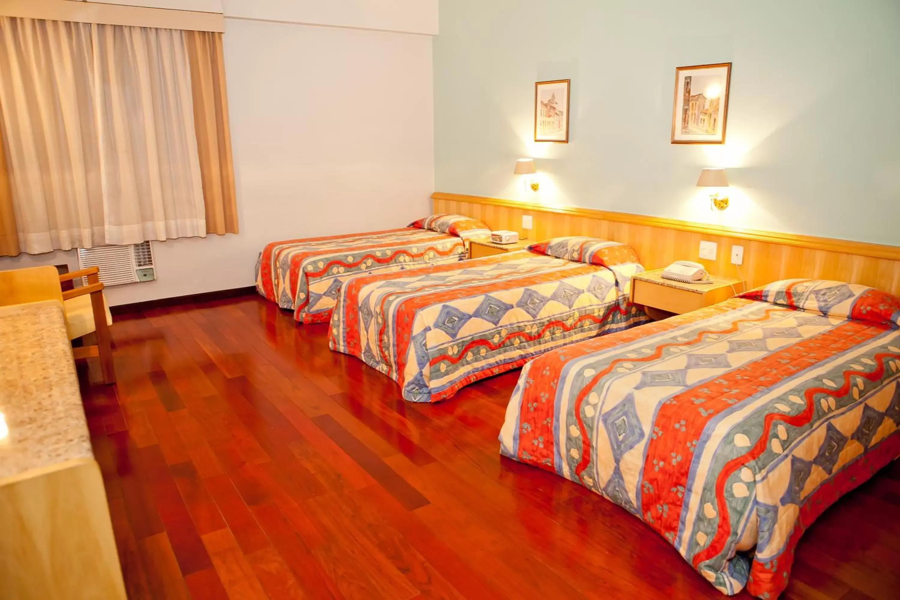 Bed in Ritz Plaza Hotel Bed in Ritz Plaza Hotel