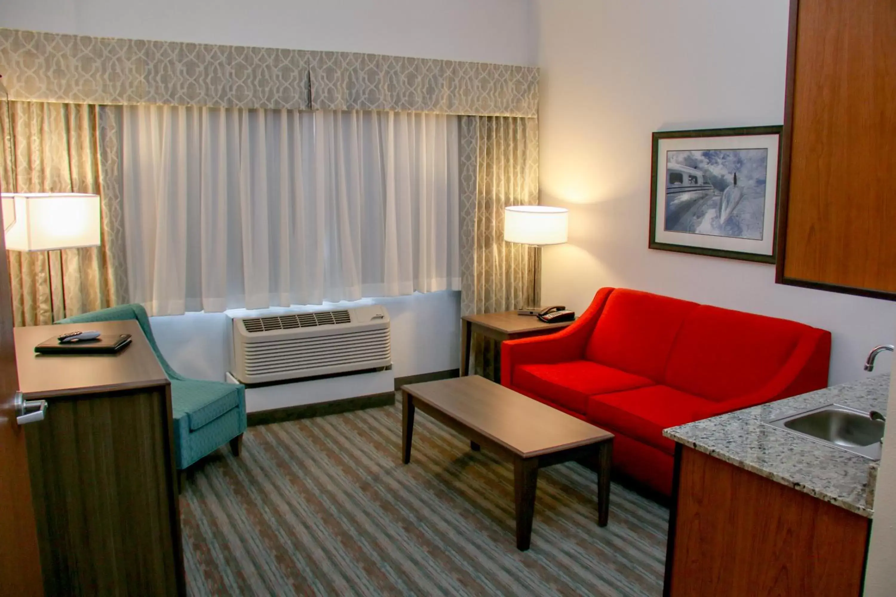 Kitchen or kitchenette, Seating Area in Holiday Inn Hotel & Suites Denver Tech Center-Centennial, an IHG Hotel