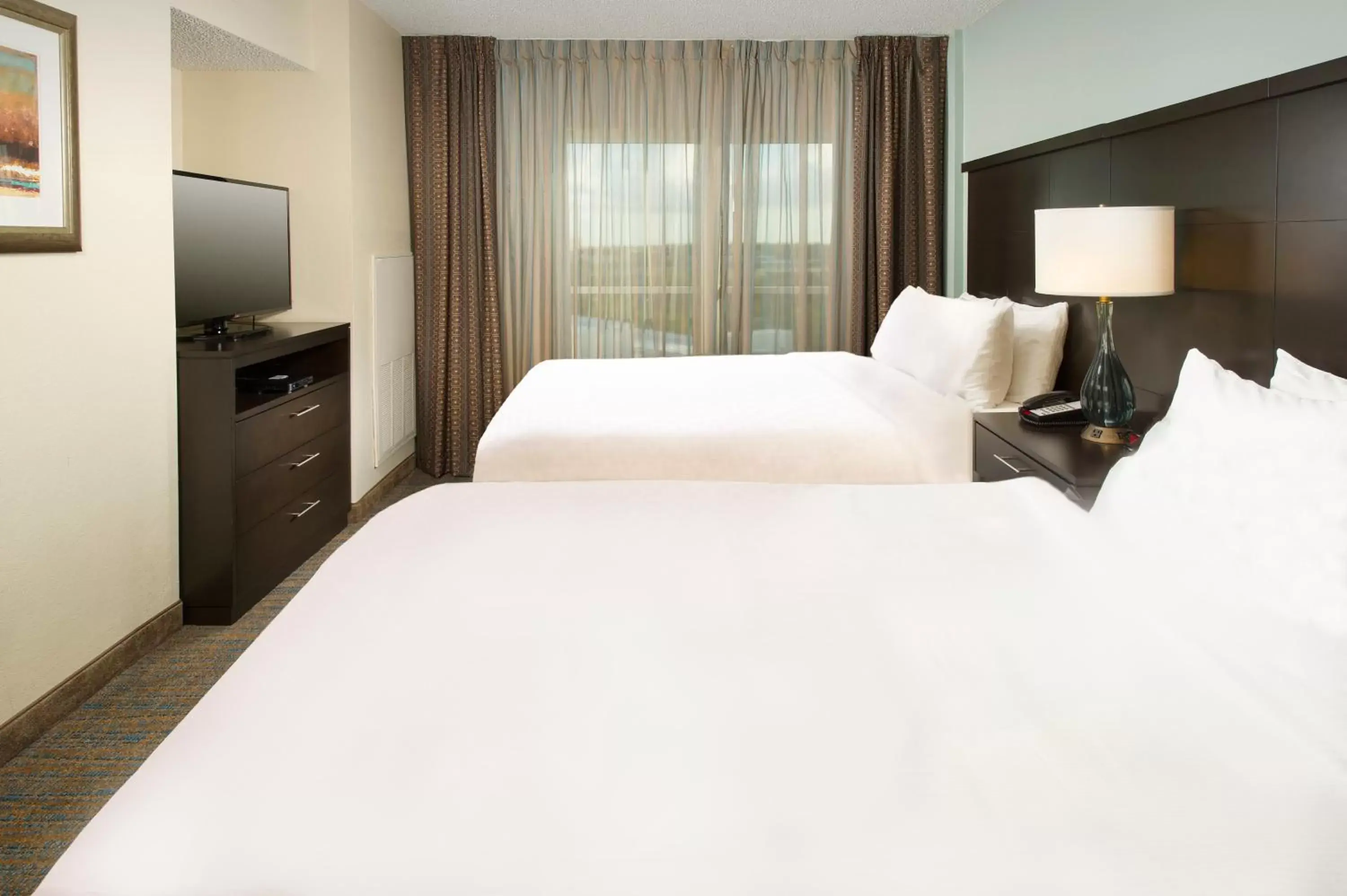 Bed in Staybridge Suites - Colorado Springs NE Powers, an IHG Hotel