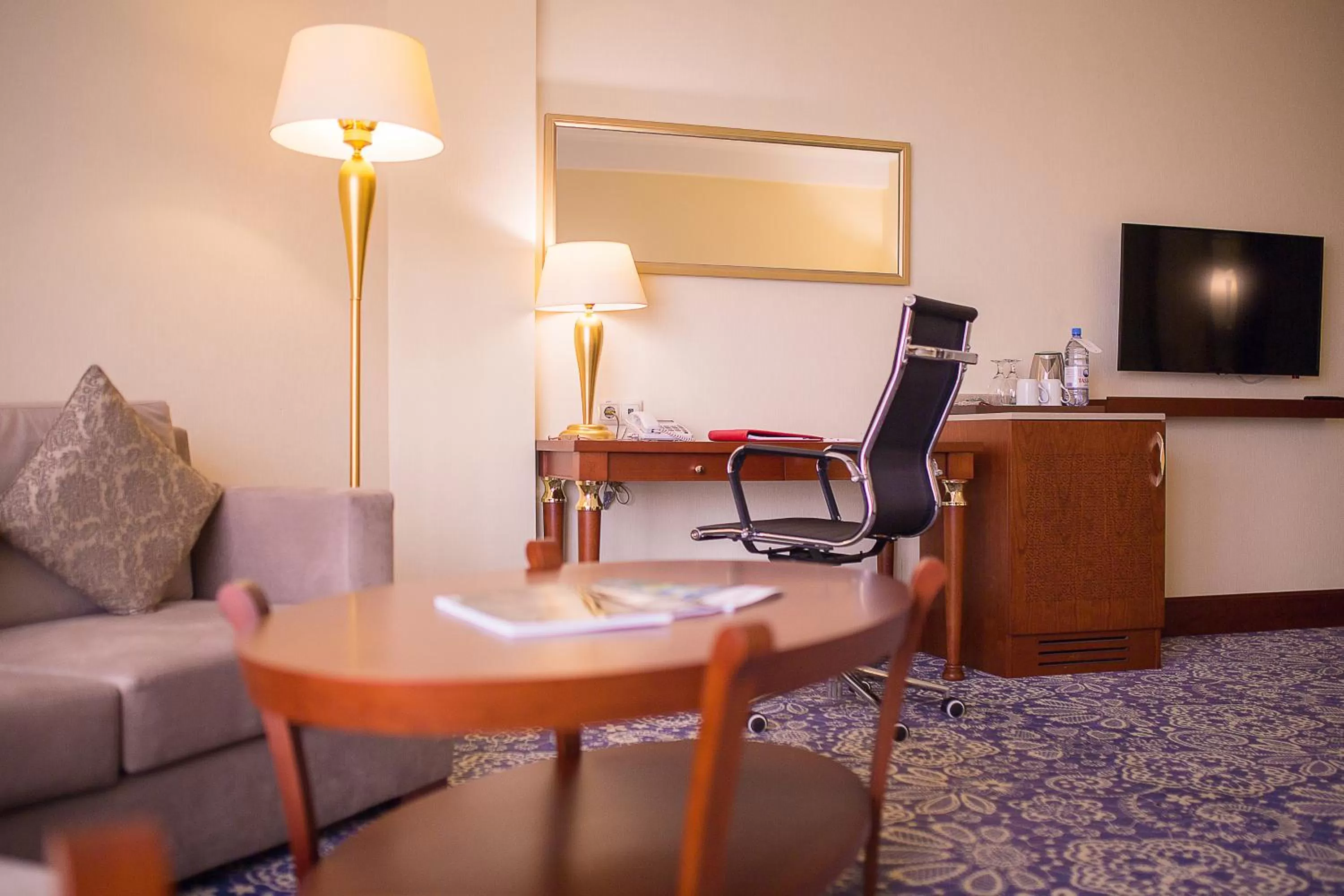 Seating area in Ramada by Wyndham Almaty