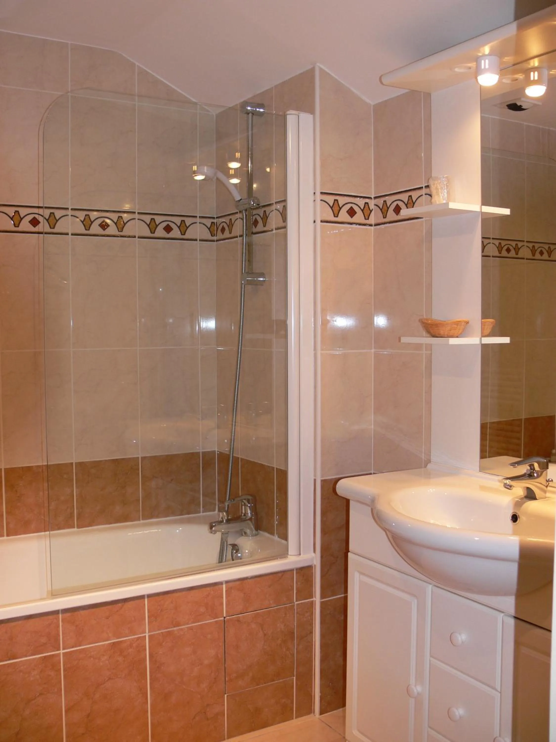 Bathroom in Logis Hotels Le Champalud Restaurant La Citadelle