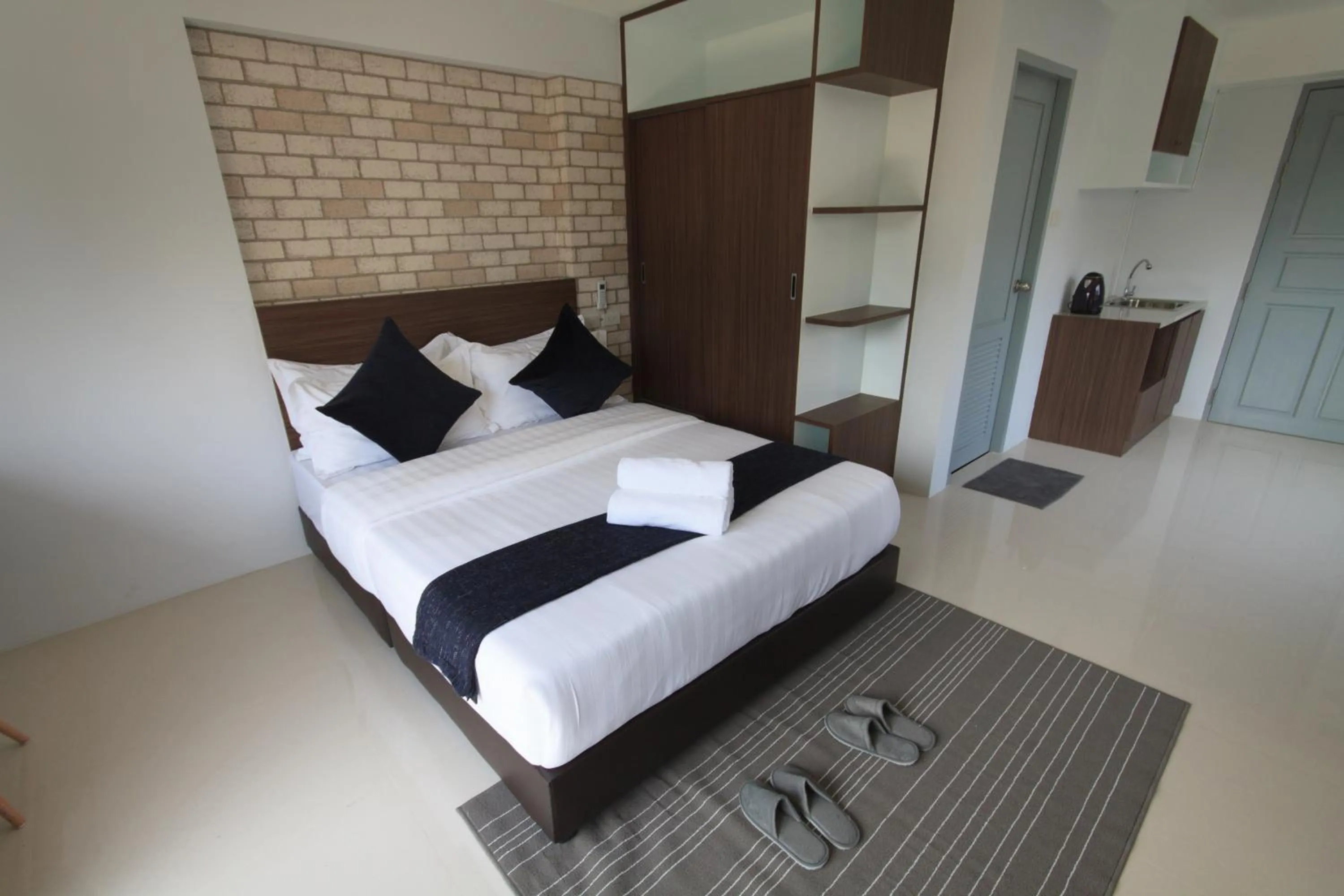 Bed in Q Space Residence