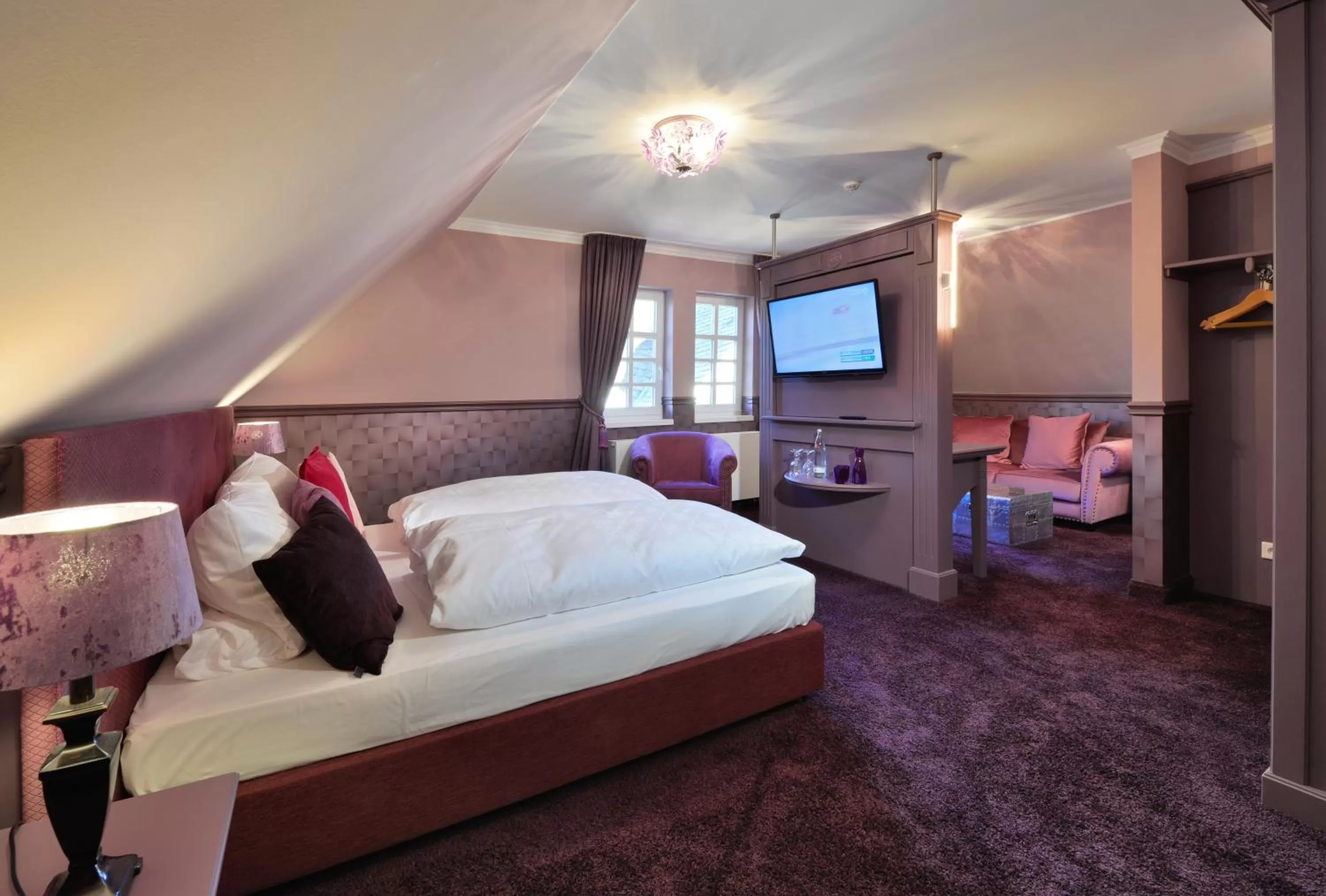 Seating area, Bed in Hotel Alte Schule