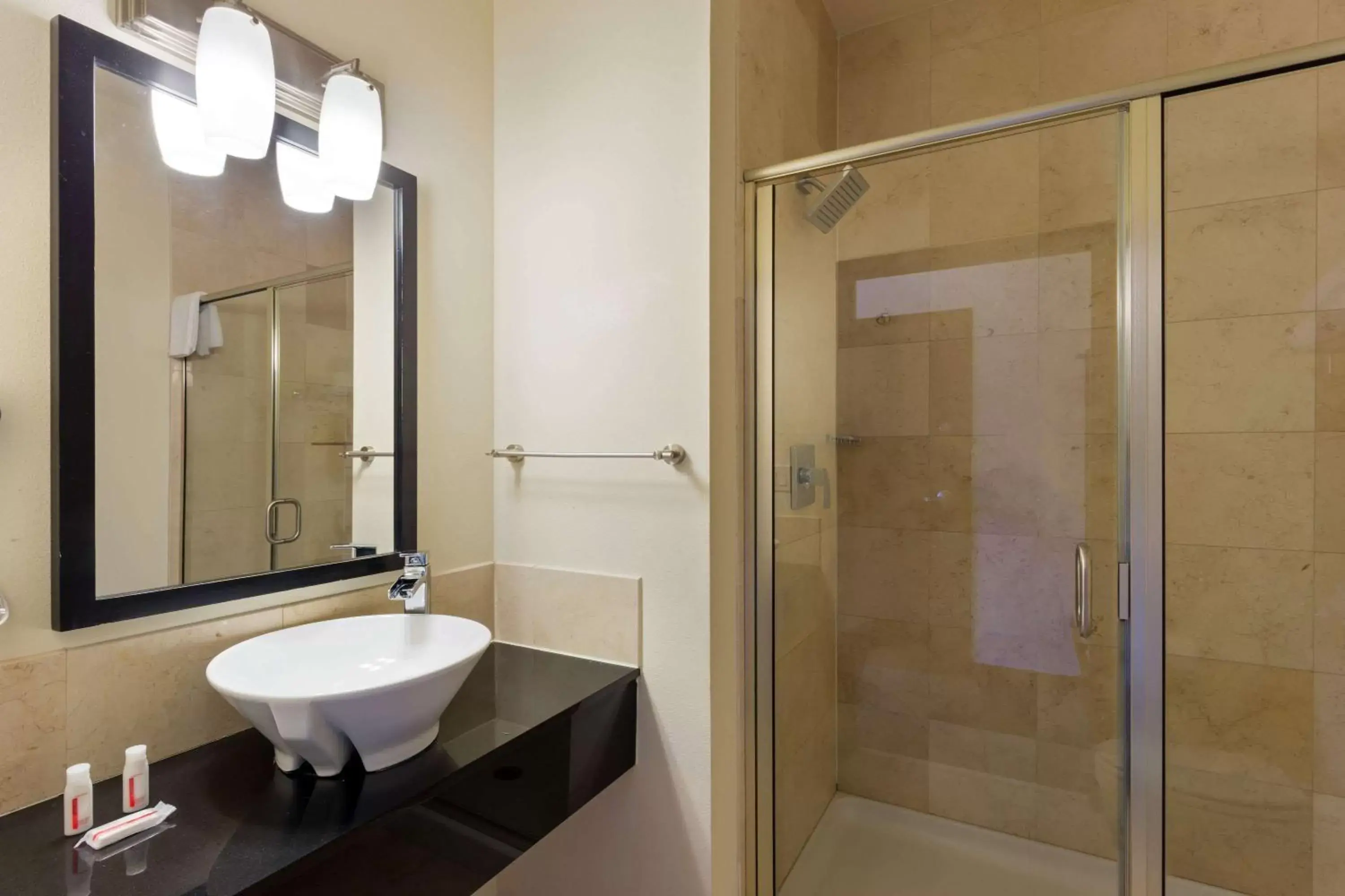 Bathroom in Days Inn & Suites by Wyndham Milwaukee